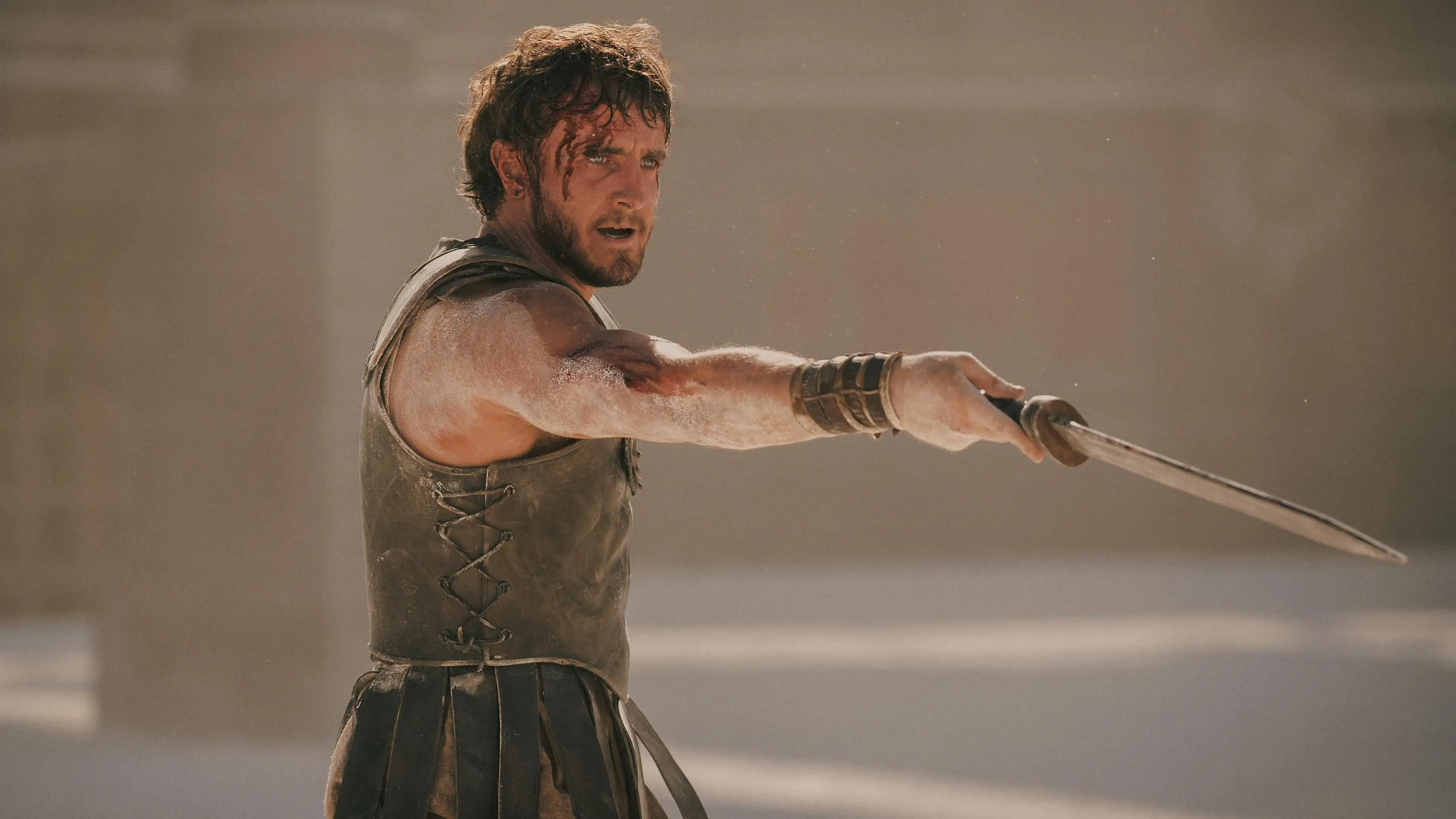 Paul Mescal holding a sword in Gladiator II