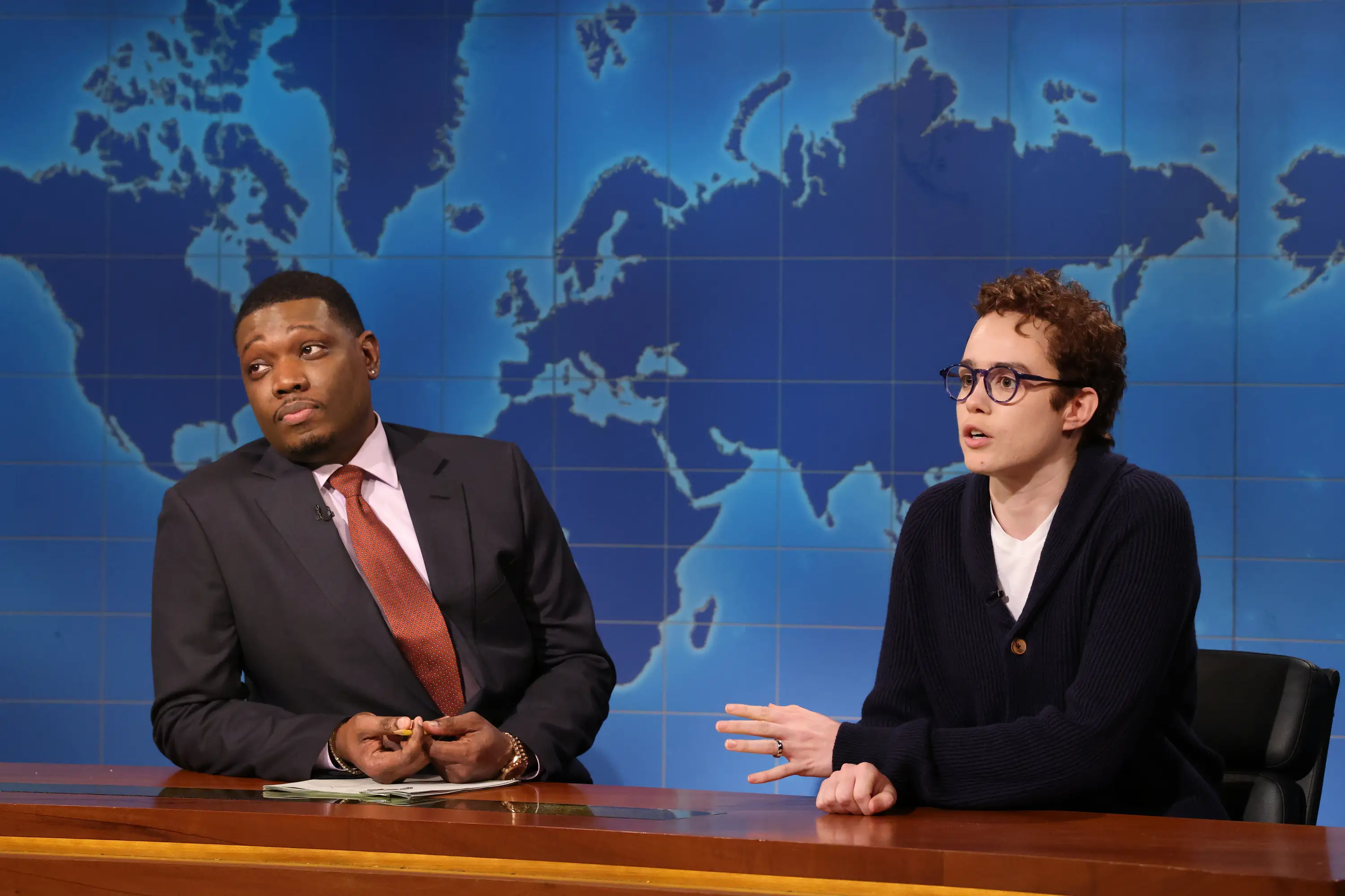 SATURDAY NIGHT LIVE -- Episode 1905 -- Pictured: (l-r) Anchor Michael Che and Jane Wickline as Dario Amodei during Weekend Update on Saturday, September 26, 2026 -- (Photo by: Will Heath/NBC via Getty Images)