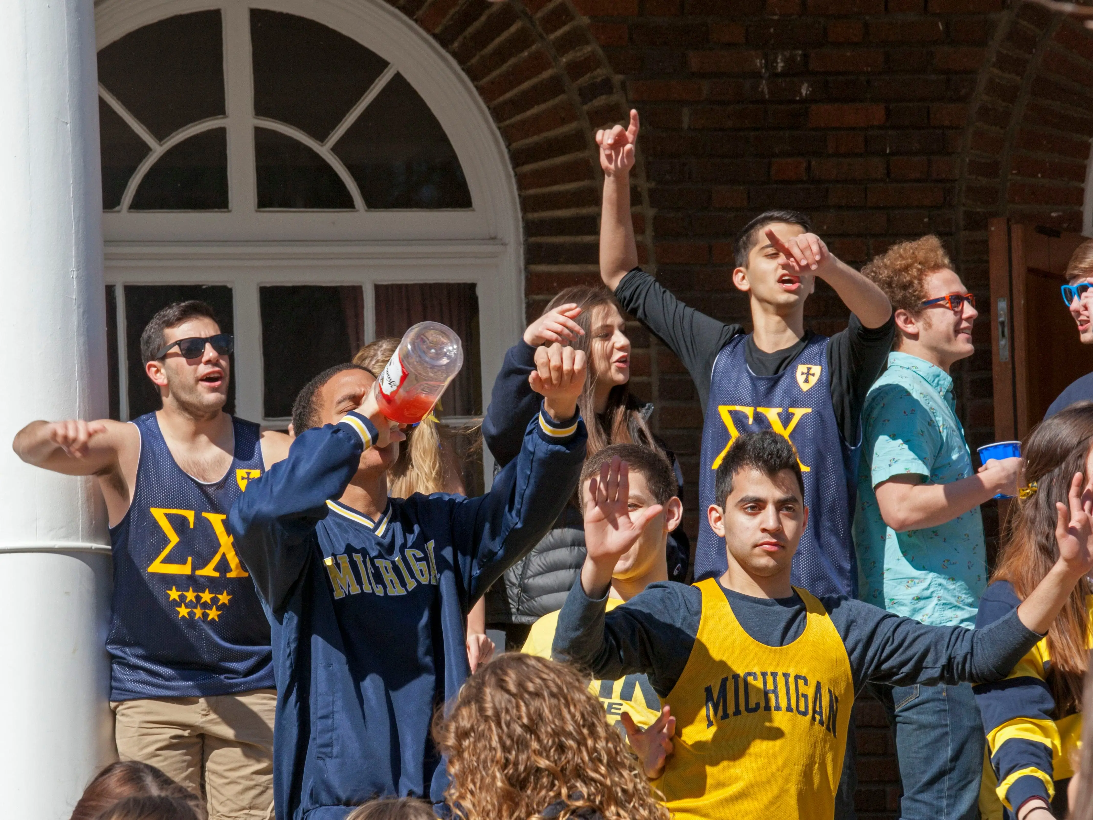Ann Arbor, Michigan, Students at the University of Michigan gather at the Sigma Chi fraternity house to drink alcohol on a Saturday afternoon. (Photo by: Jim West/UCG/Universal Images Group via Getty Images)