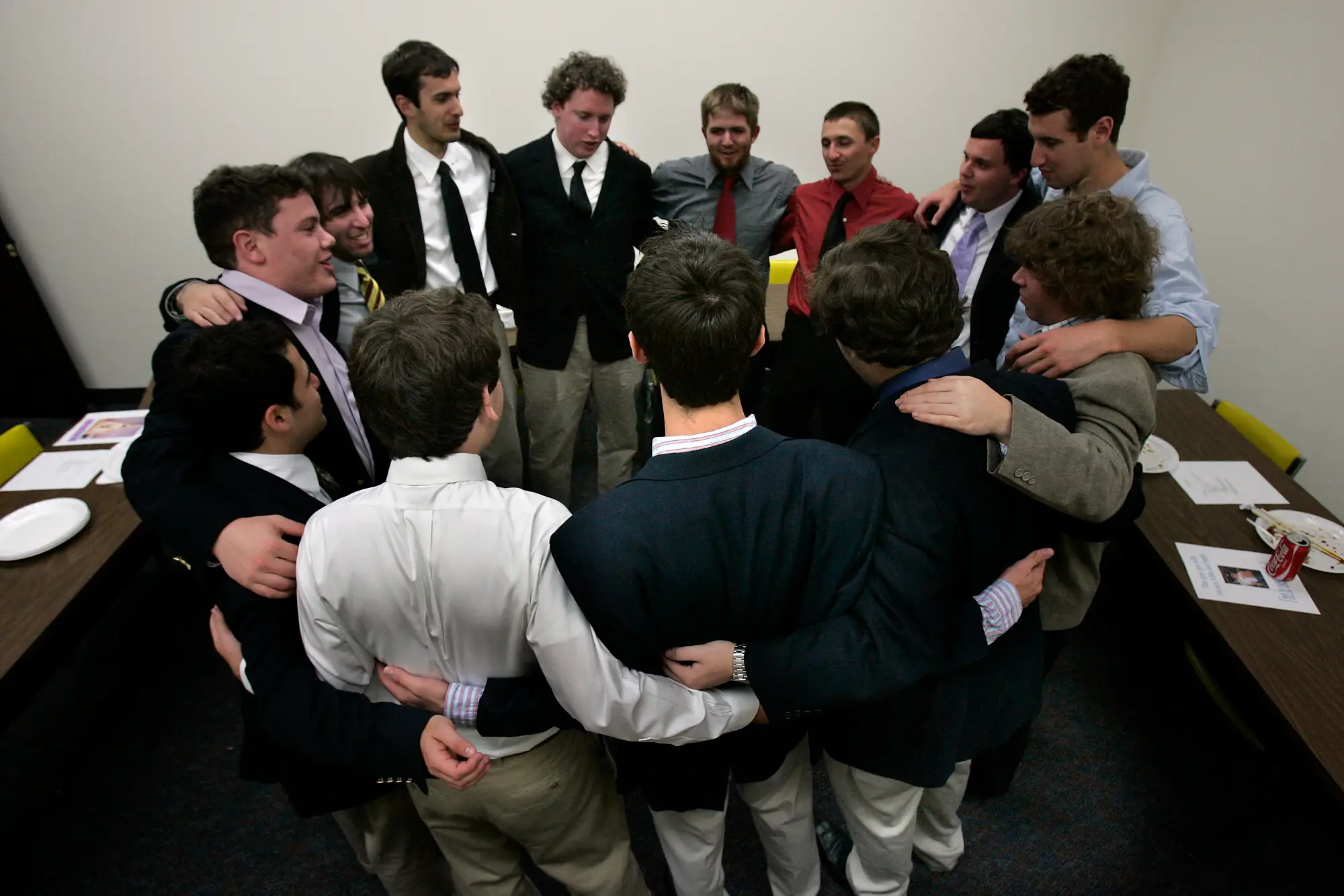 Photo at meeting where fraternity brothers gathered for the brotherhood song at the Sigma Alpha Mu chapter, the first one allowed back in USC after the process of recolonizing their fraternity system for the first time in 10 years.