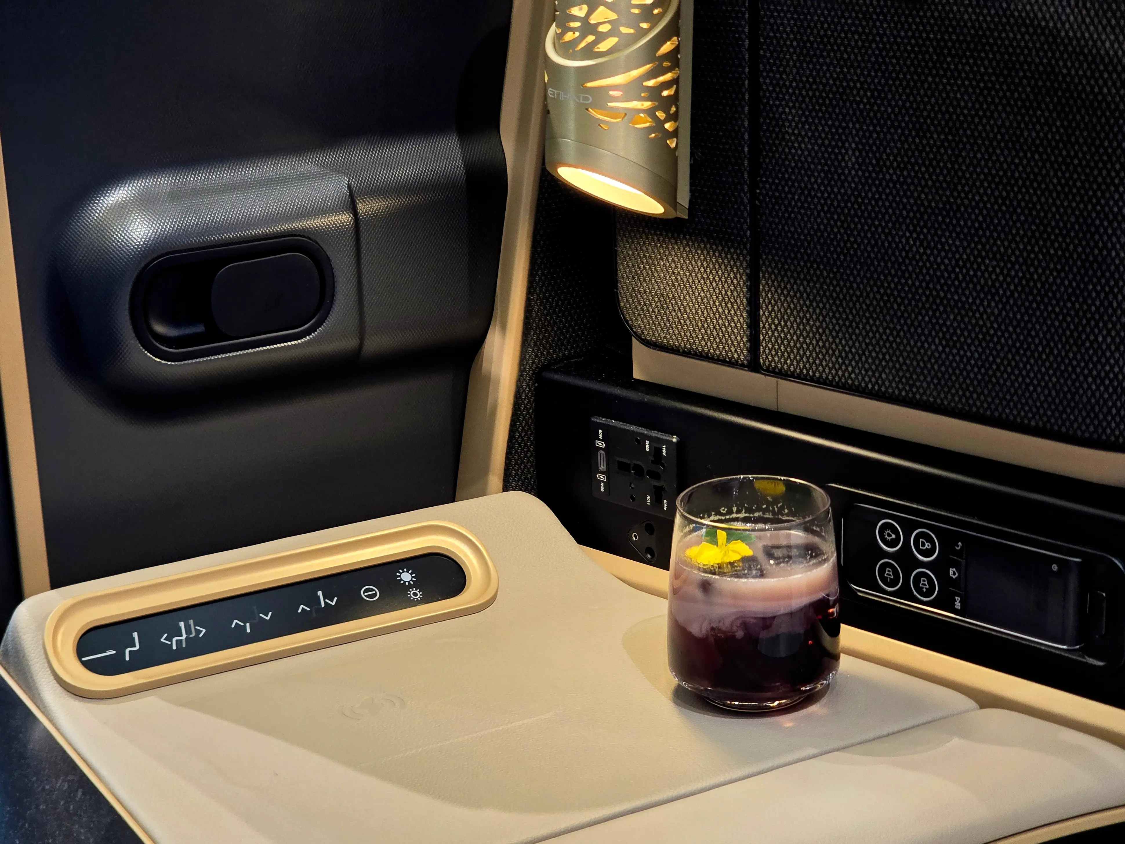 The wireless charging and controls in business class.