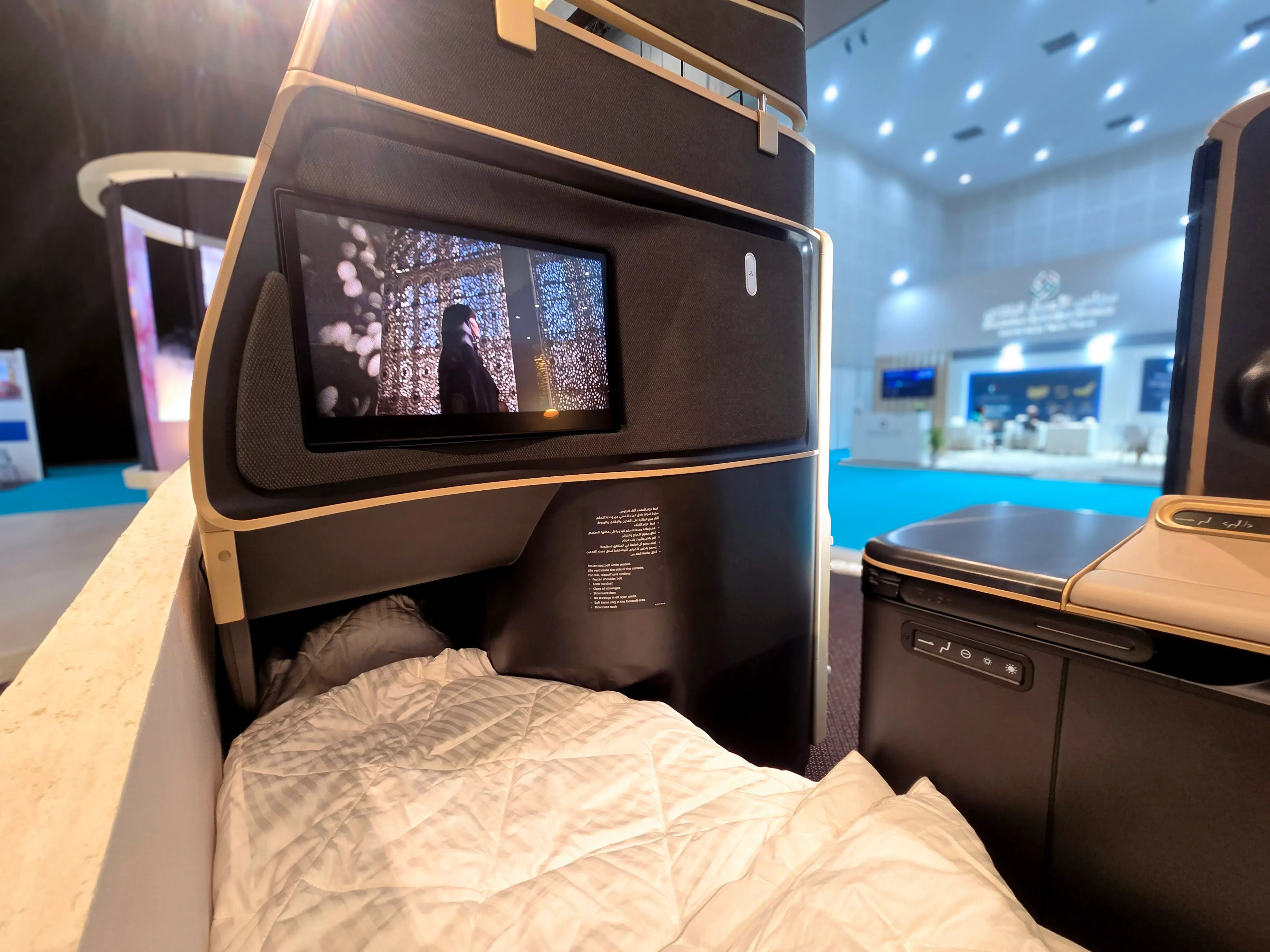 Business class seat looking at the TV.