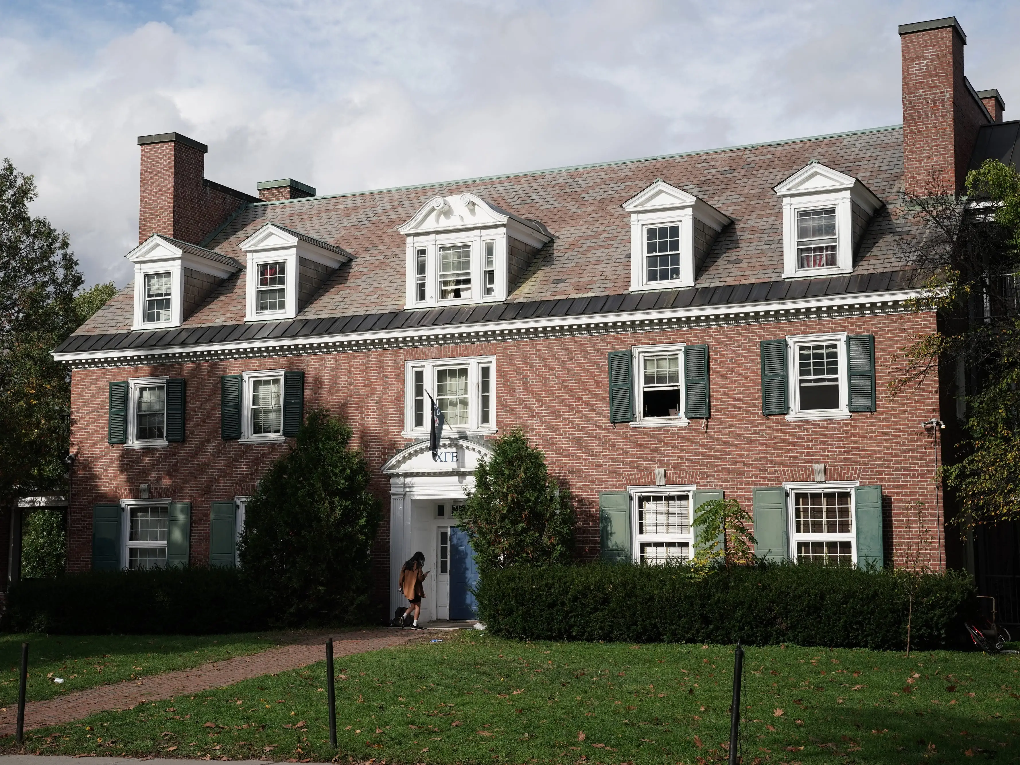 A fraternity house on campus at Dartmouth College in Hanover, New Hampshire, U.S., on Sunday, Oct. 17, 2021. Dartmouth Colleges endowment returned 47% in the fiscal year that ended in June, the latest university to post some of the strongest investment gains in decades.