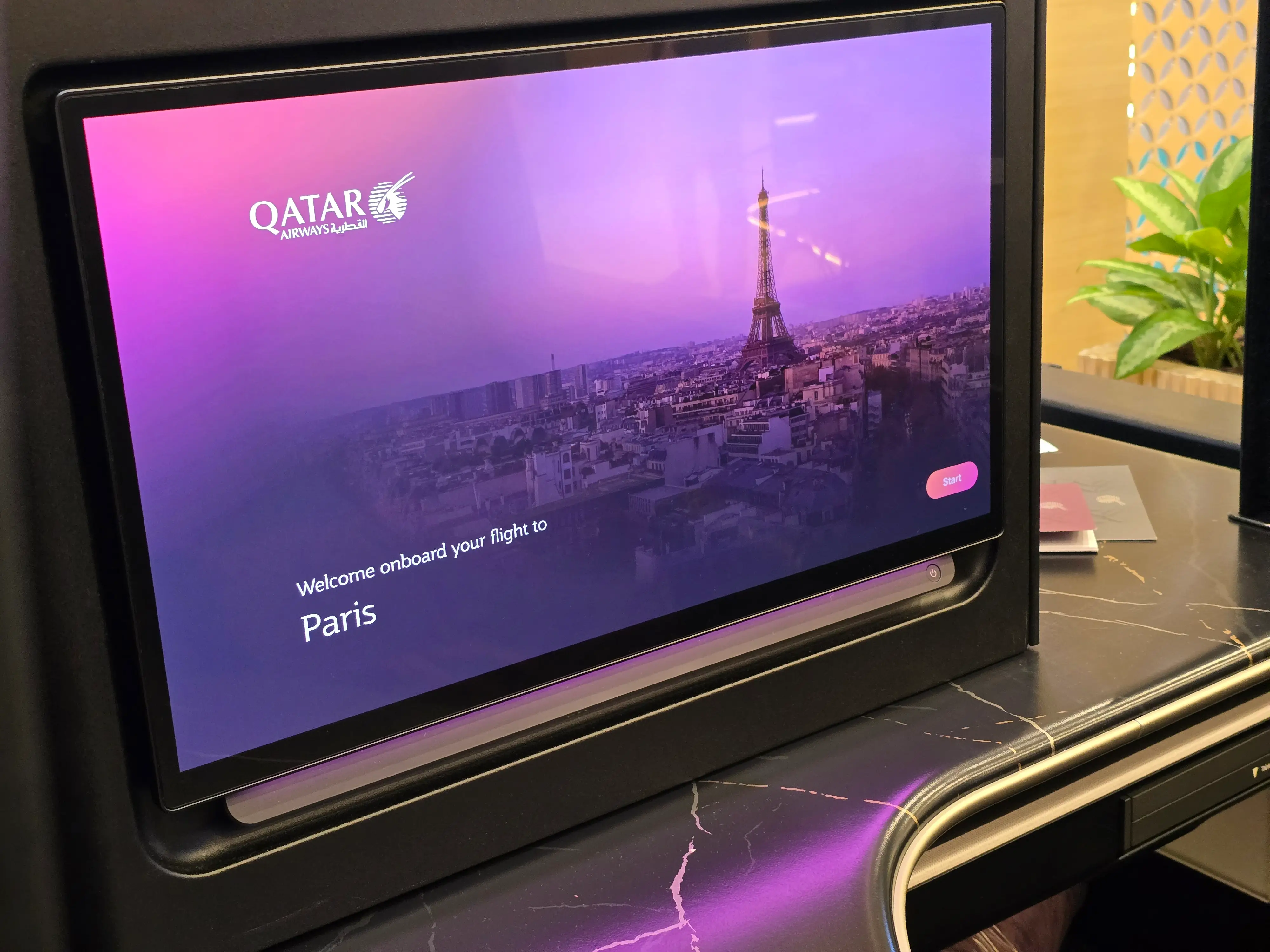 The Qsuite screen swings aside.