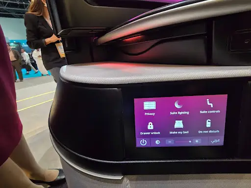 The make my bed button on the purple Qsuite control panel.