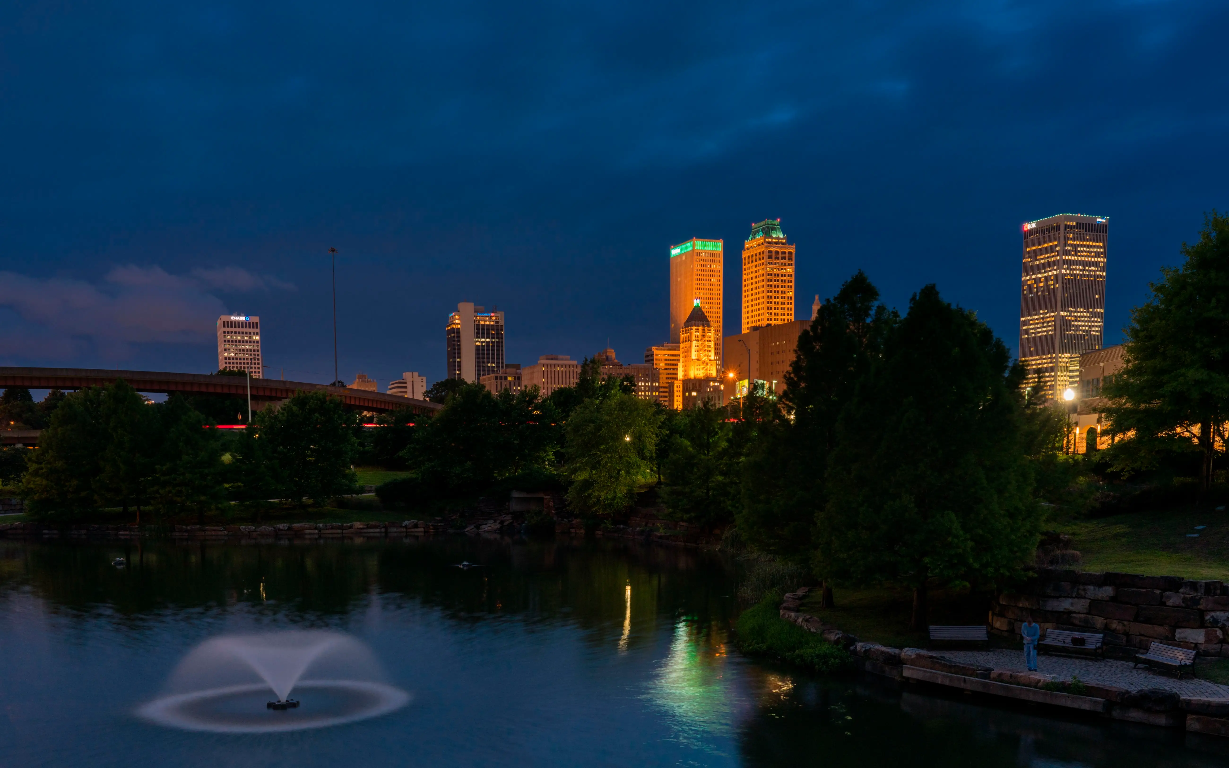 A city skyline at dusk.