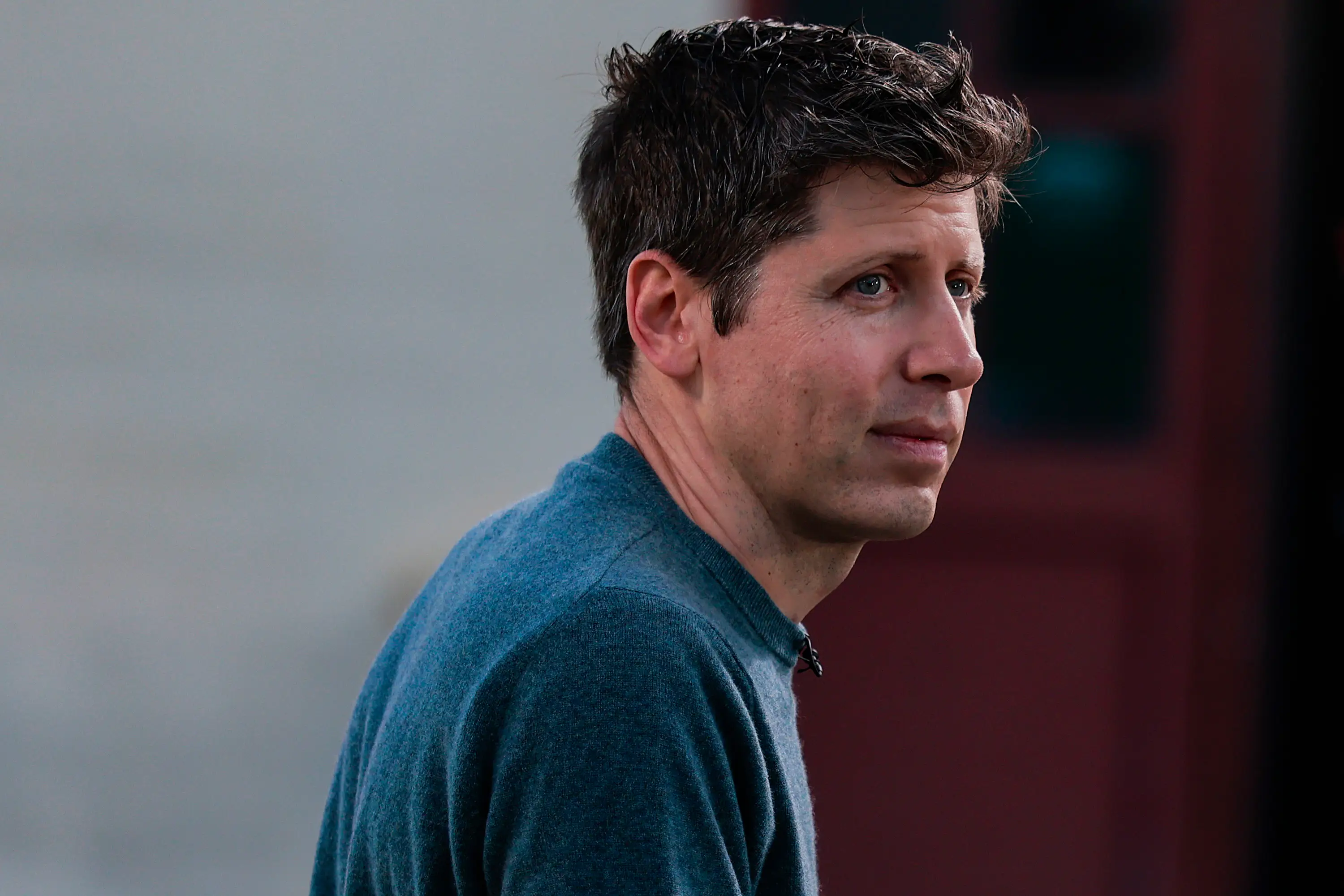 OpenAI CEO Sam Altman looks on during an interview