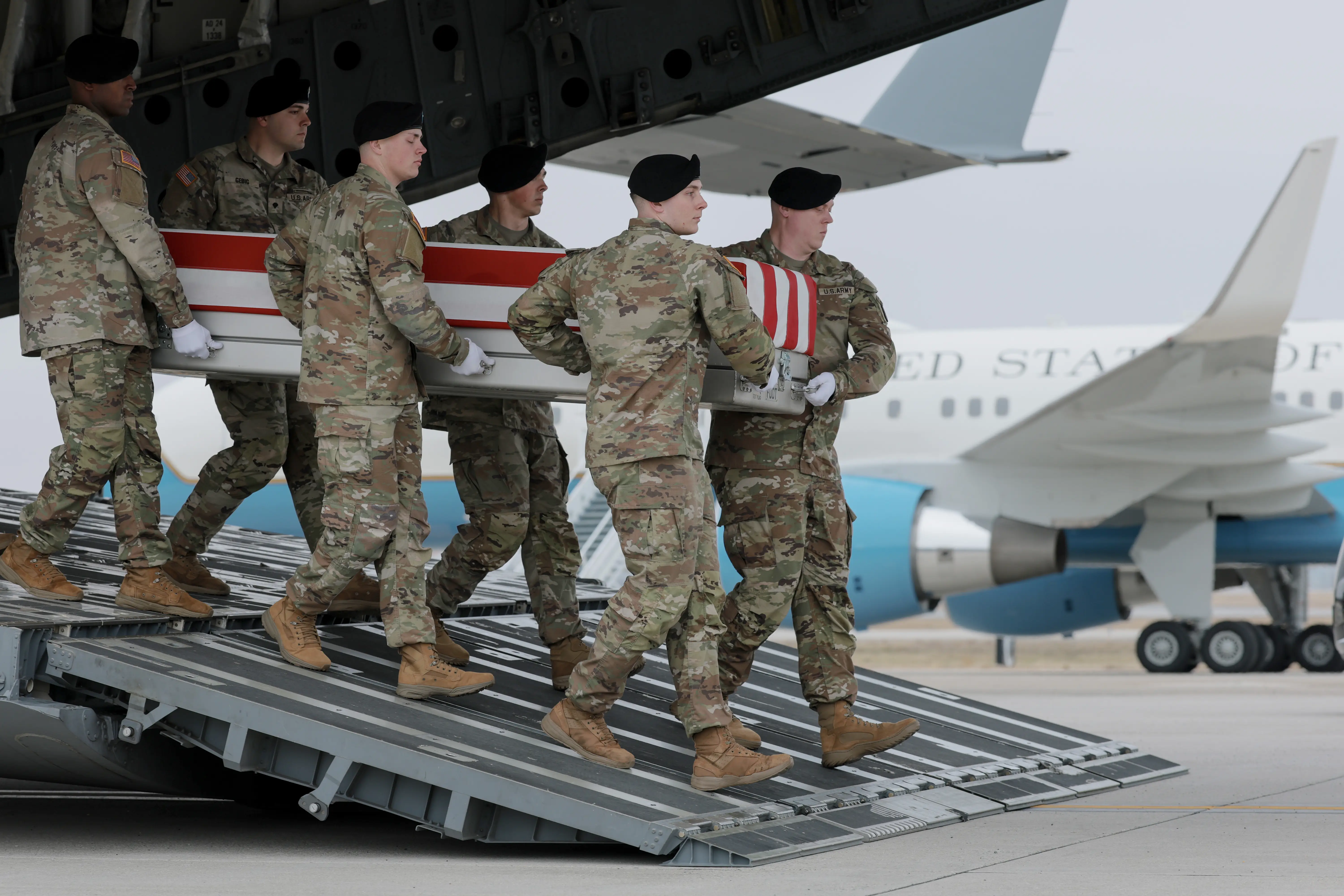 A US Army team conducts the dignified transfer of Chief Warrant Officer 3 Robert Marzan at Dover Air Force Base March 7, 2026 in Dover, Delaware. Marzan was one of six soldiers killed in action by an Iranian drone strike March 1 in Port Shuaiba, Kuwait during Operation Epic Fury.