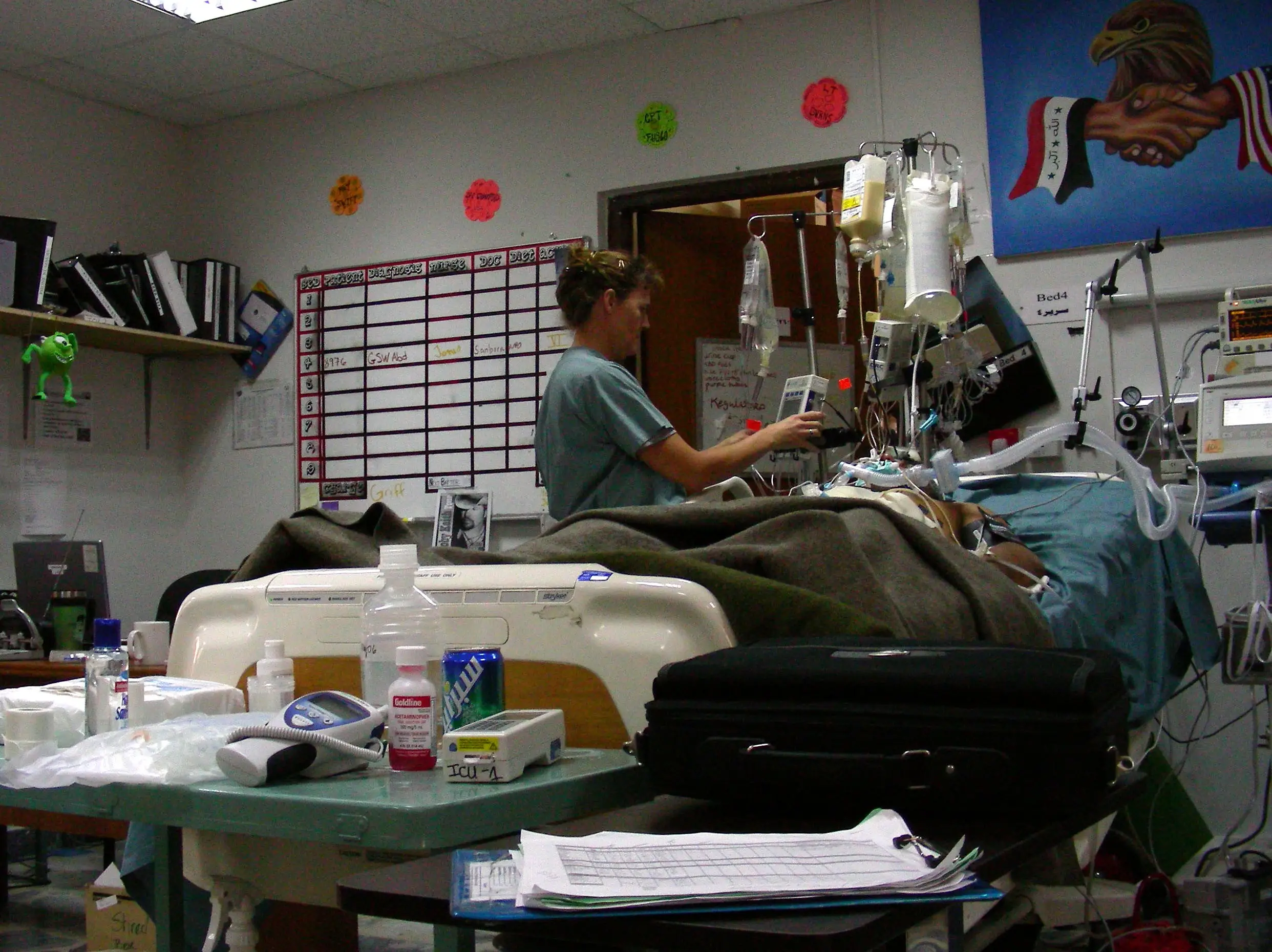 An Army medical provider and patient at the Ibn Sina Hospital, a US military Role 3 facility, in Baghdad, Iraq, Jan. 1, 2007.