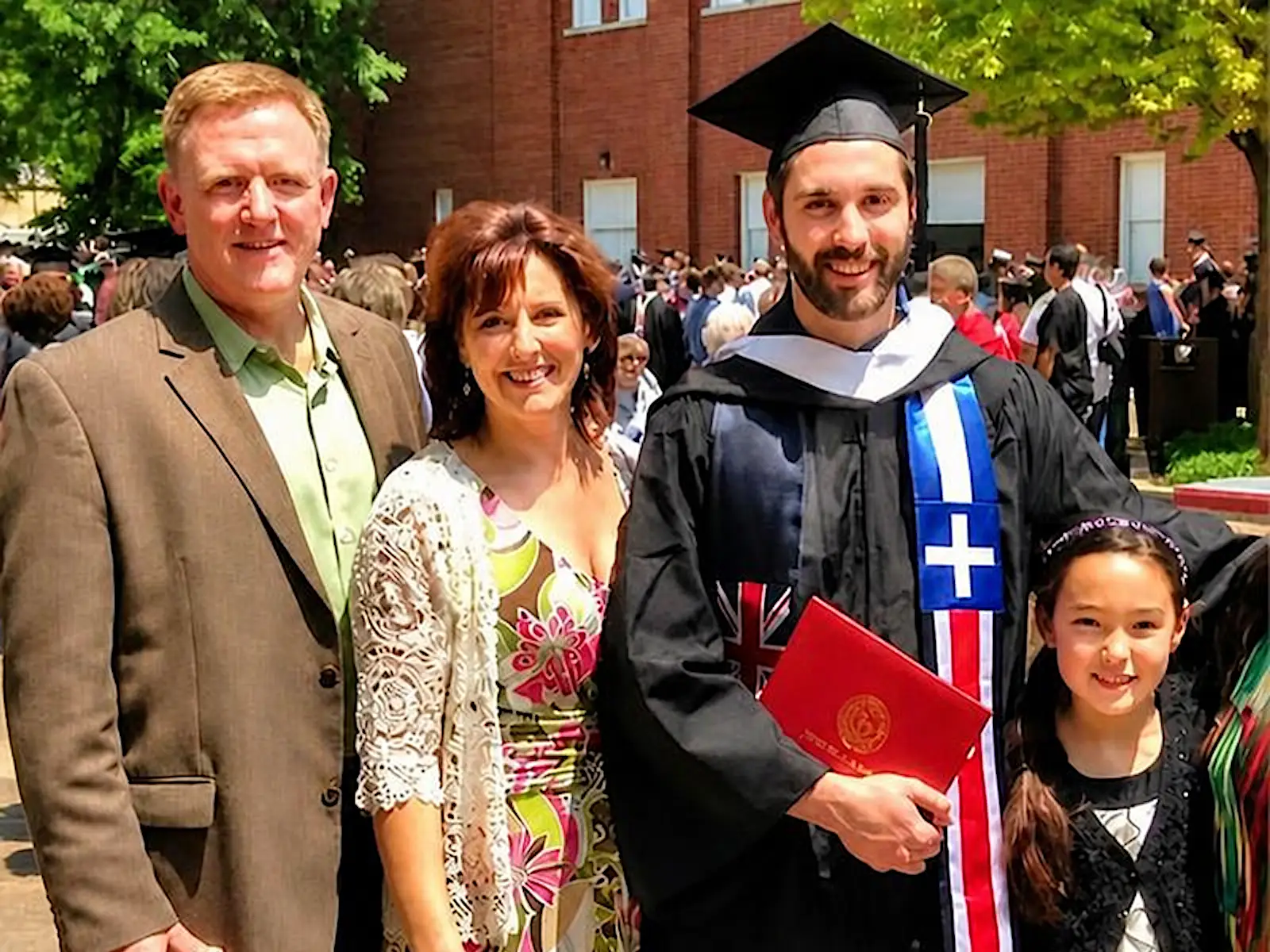 The author with her husband and two of her kids at her son's graduation