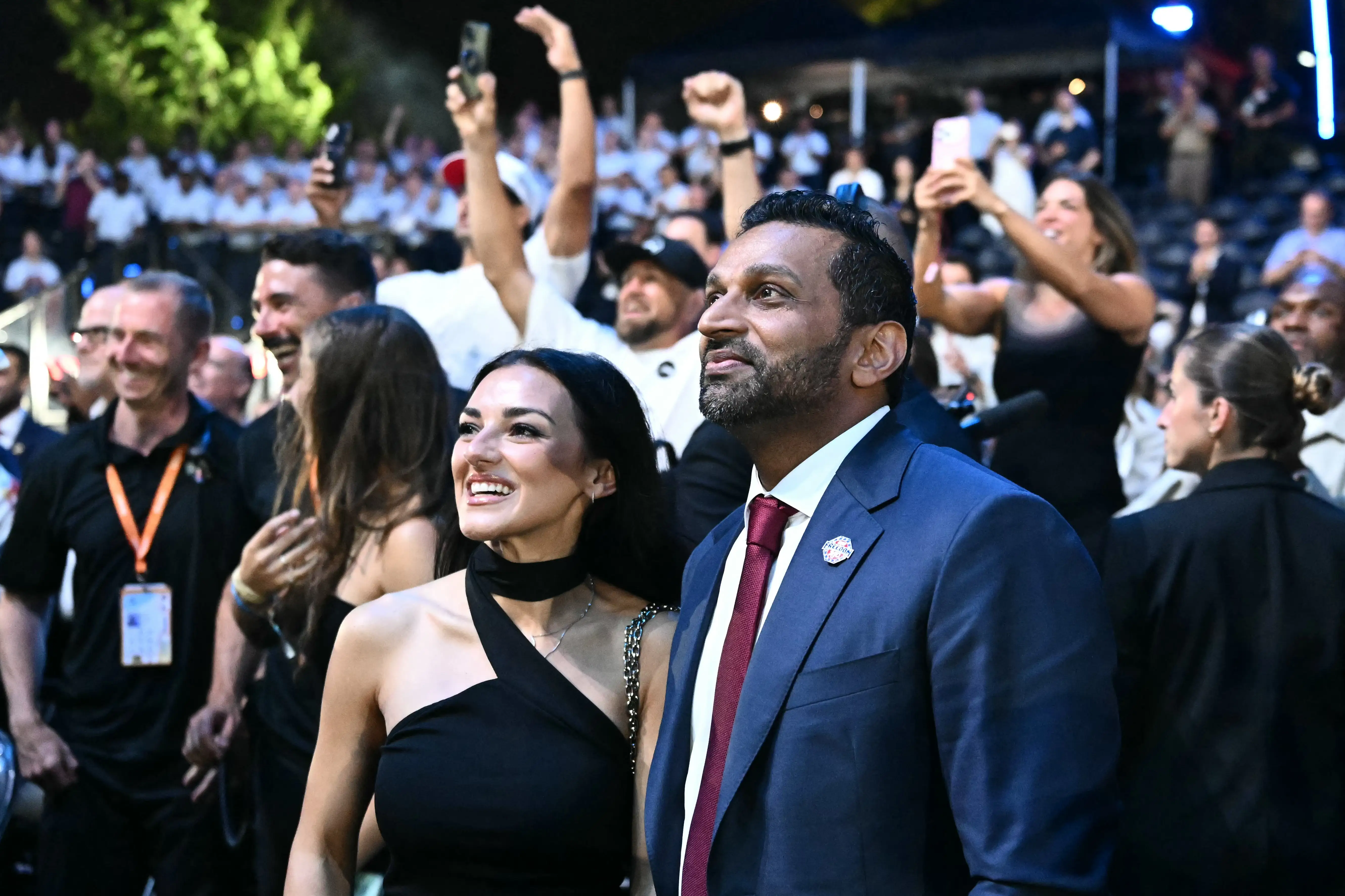 FBI Director Kash Patel stands with singer Alexis Wilkins.