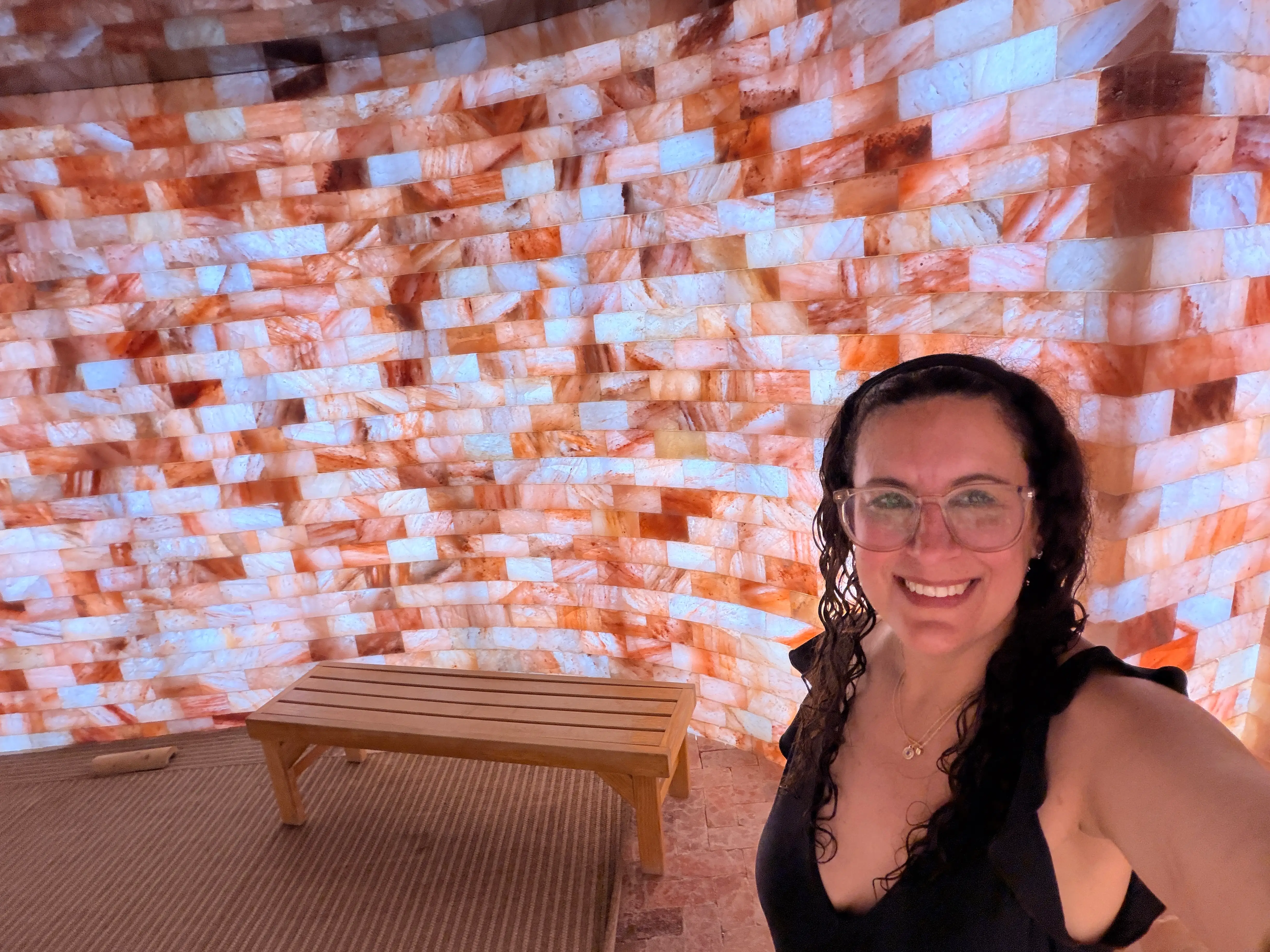 the author in a pink Himalayan salt sauna