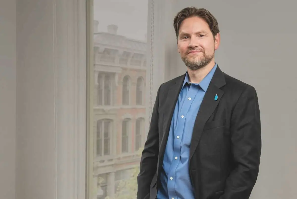 head shot of Karl Strovink, the CEO of Blue Bottle Coffee