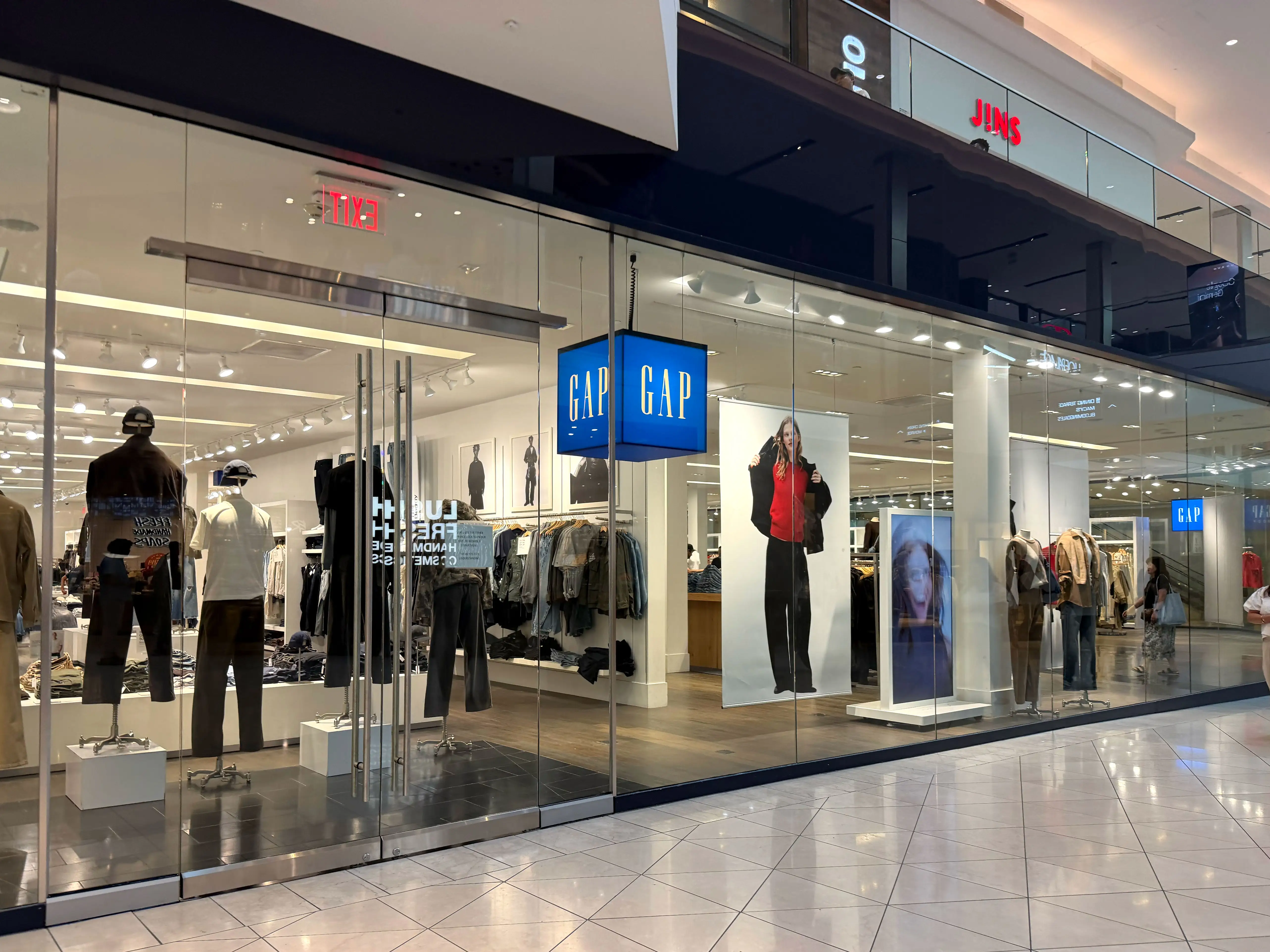 The exterior of a Gap store in a mall.