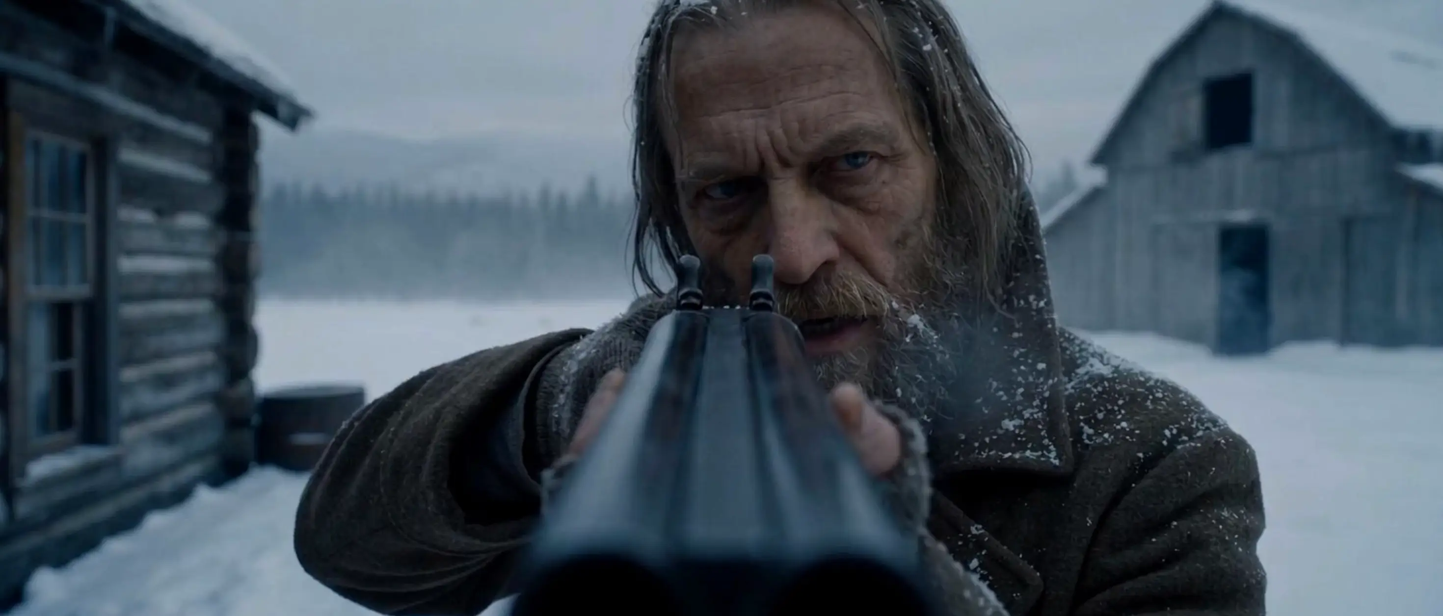 Bearded person aims a double-barreled shotgun in a snowy settlement with wooden buildings behind them.