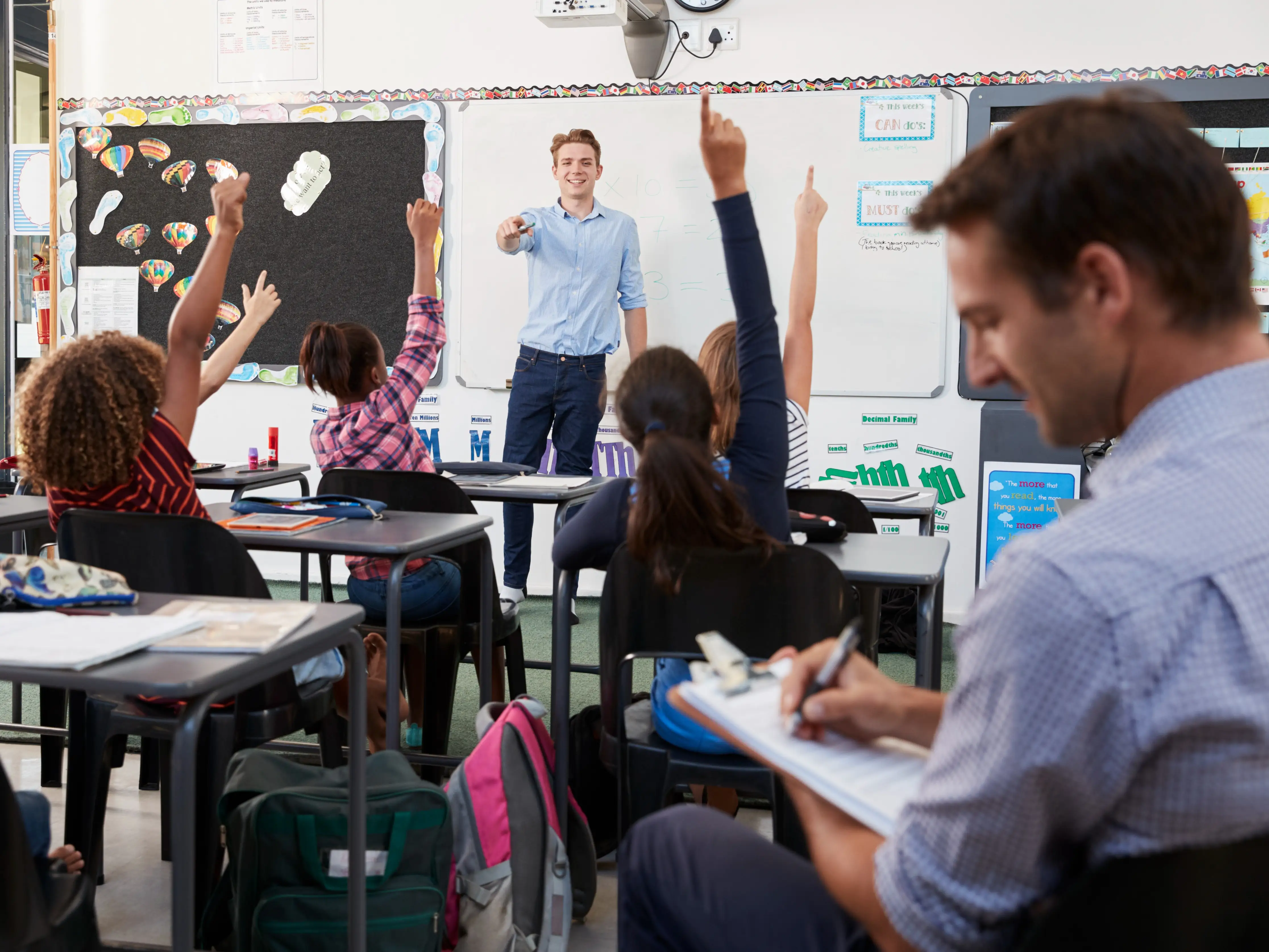 Trainee teacher learning how teach elementary students