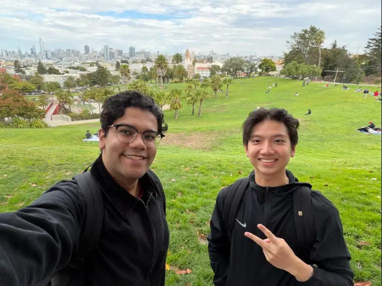 Two cofounders posing in SF.