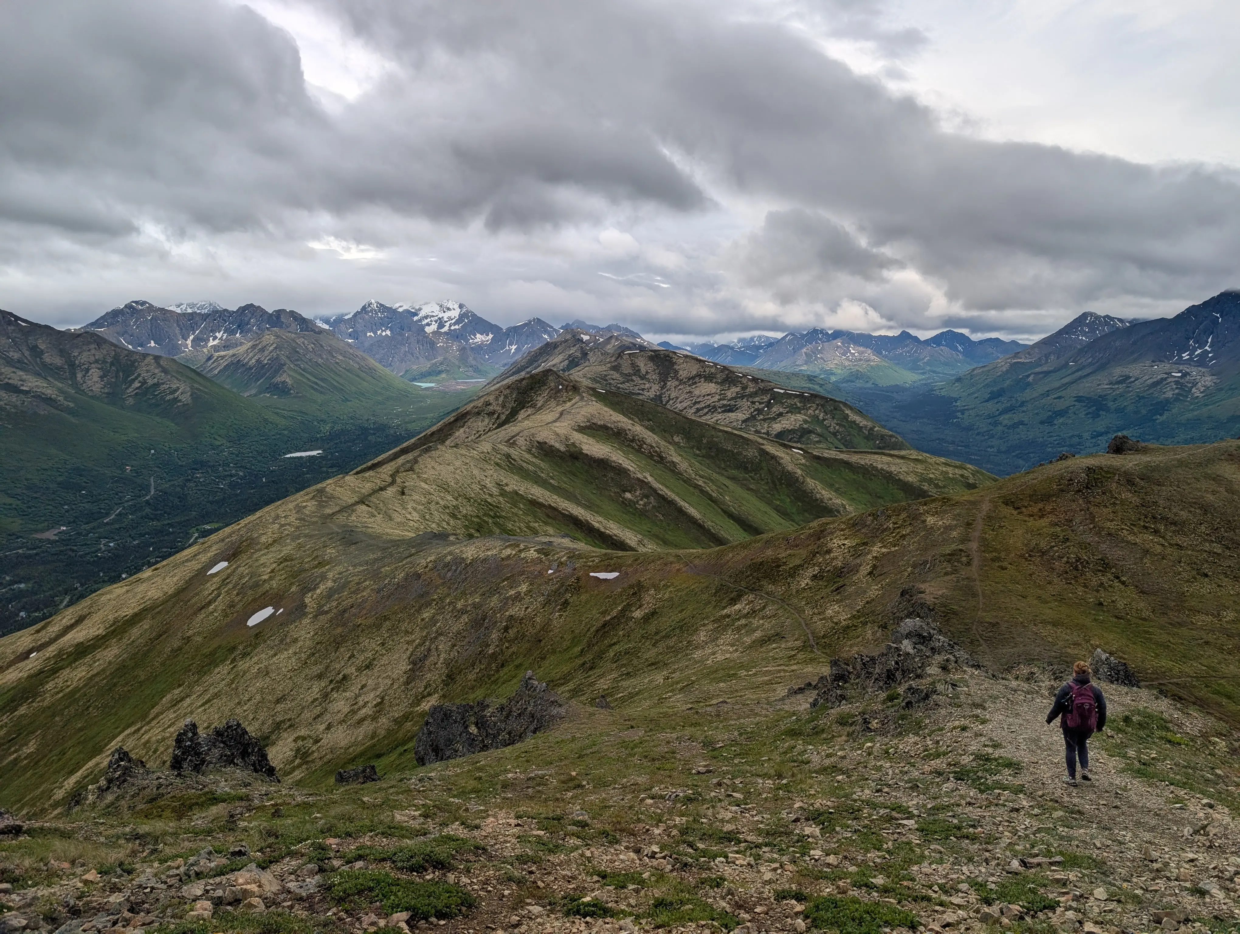 Woman hiking in Eagle River on mountains