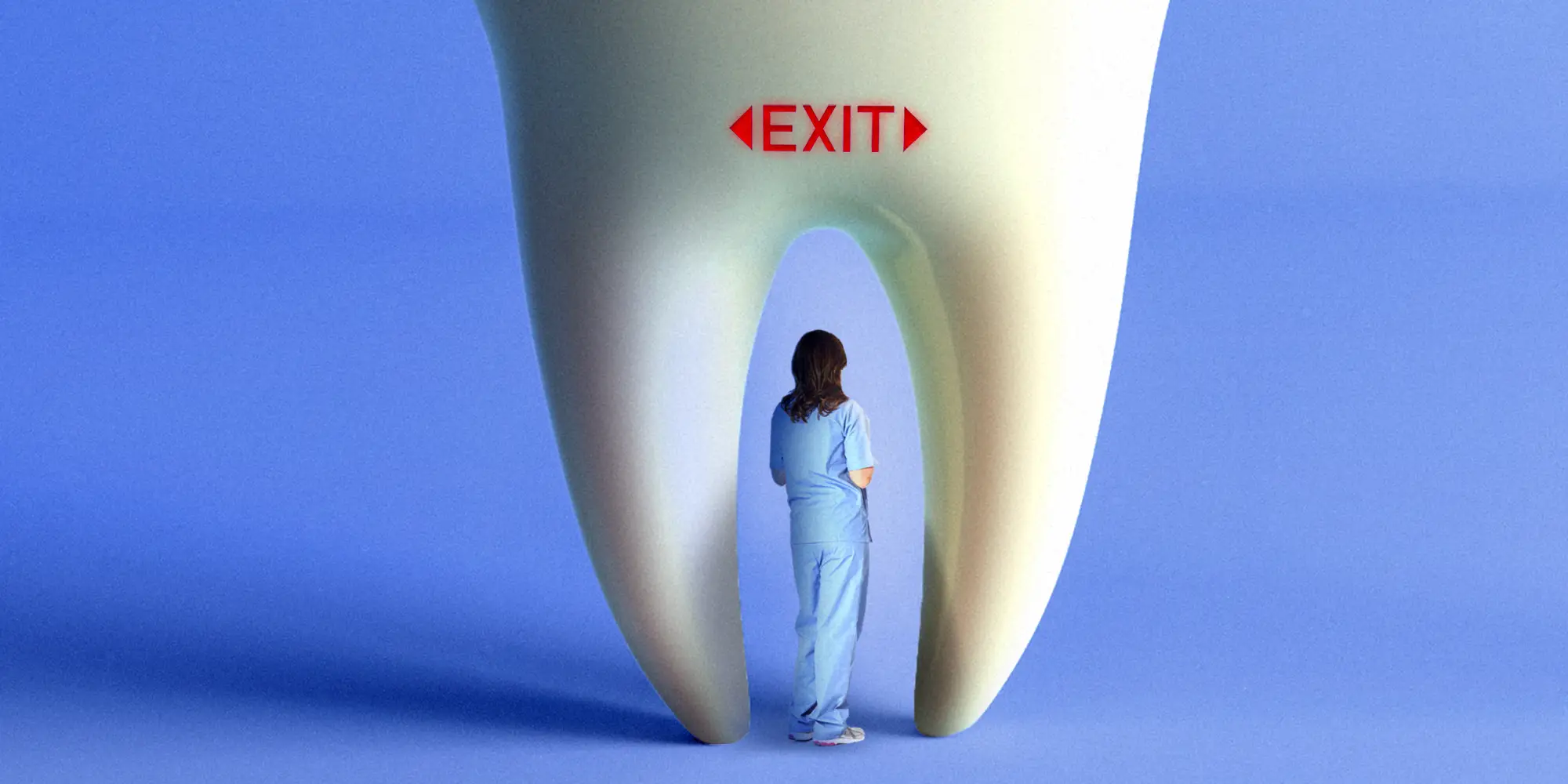 A dental hygienist in blue scrubs stands inside a giant tooth-shaped arch with a red EXIT sign.