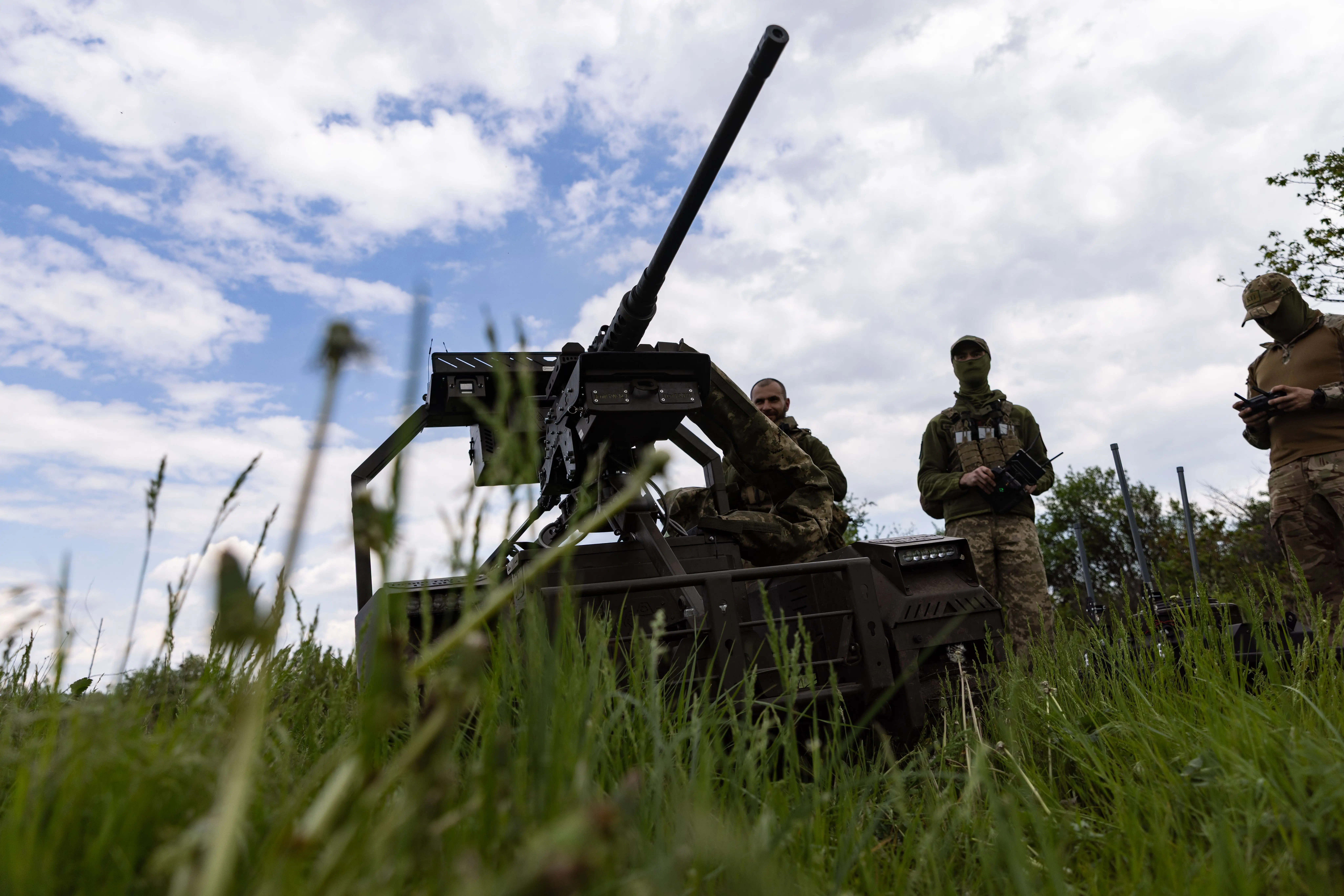 Servicemembers of the Unmanned Ground Systems unit of Ukraine's 14th Separate Mechanized Brigade 'Chervona Kalyna' prepare ground robotic vehicles for use on May 12, 2026, in Kharkiv Oblast, Ukraine.