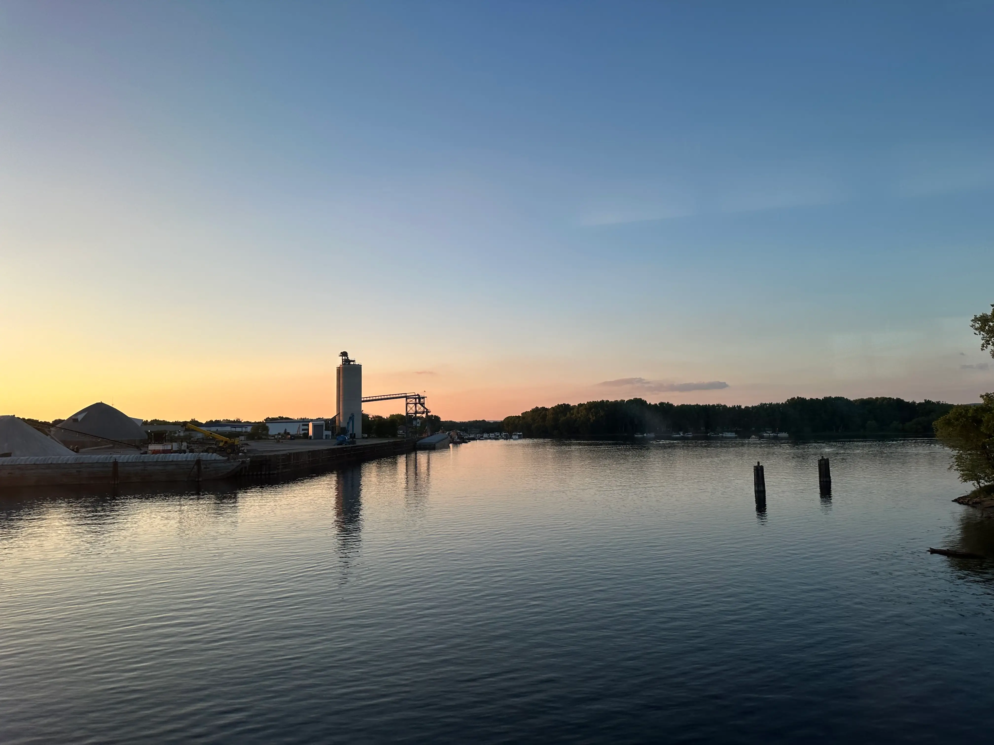 The view of the sun setting over the Mississippi River.