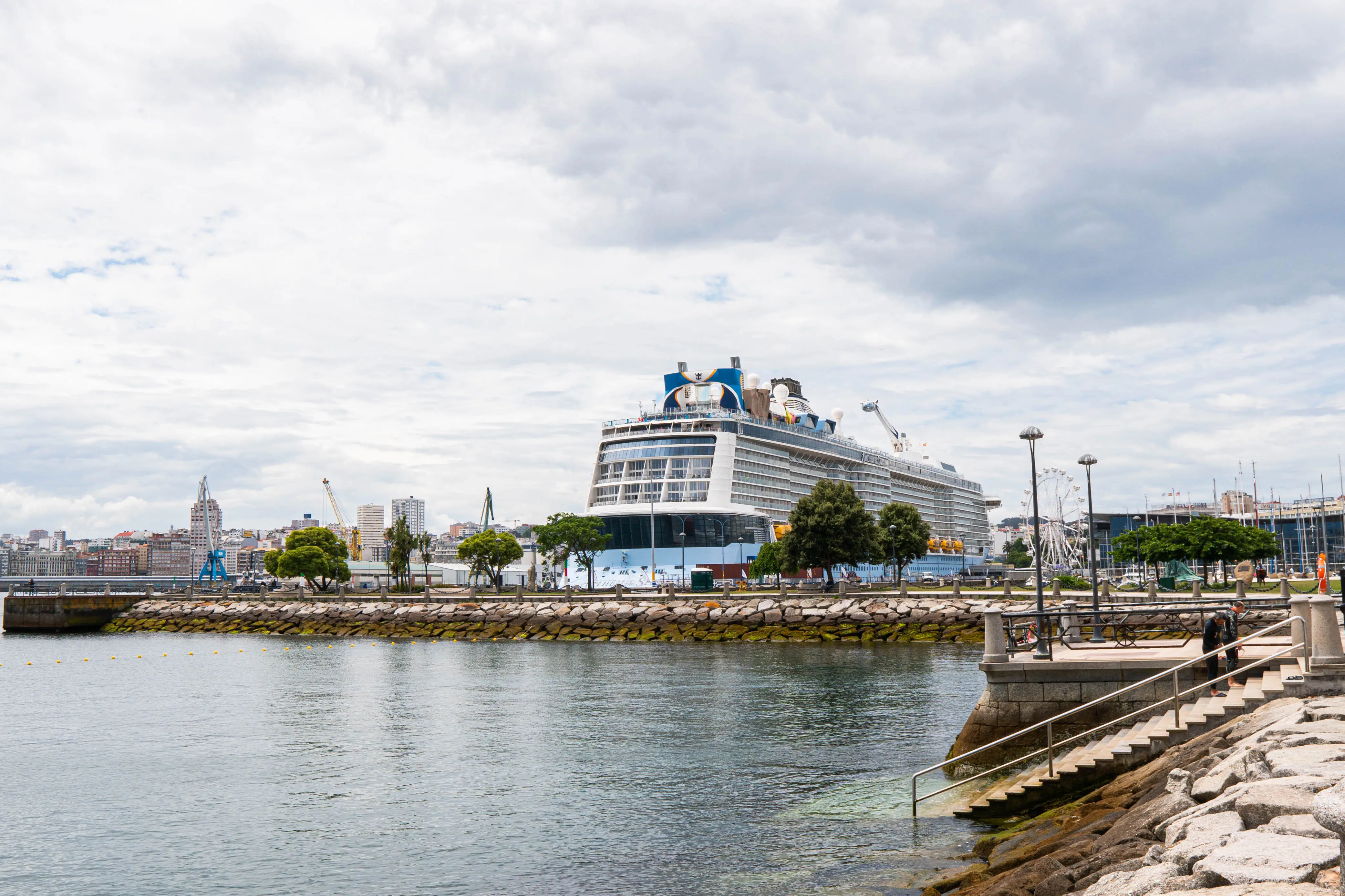Cruise ship docked by water