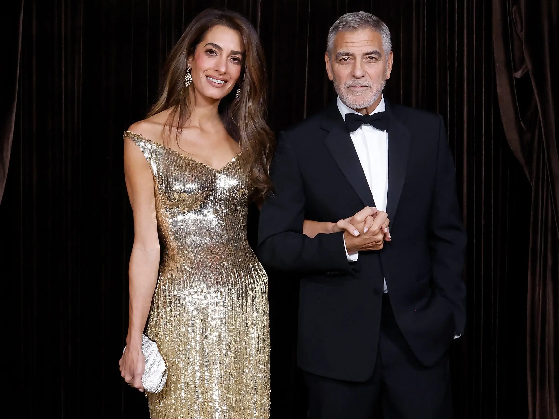 Amal Clooney and George Clooney at the 2026 Albies in London.