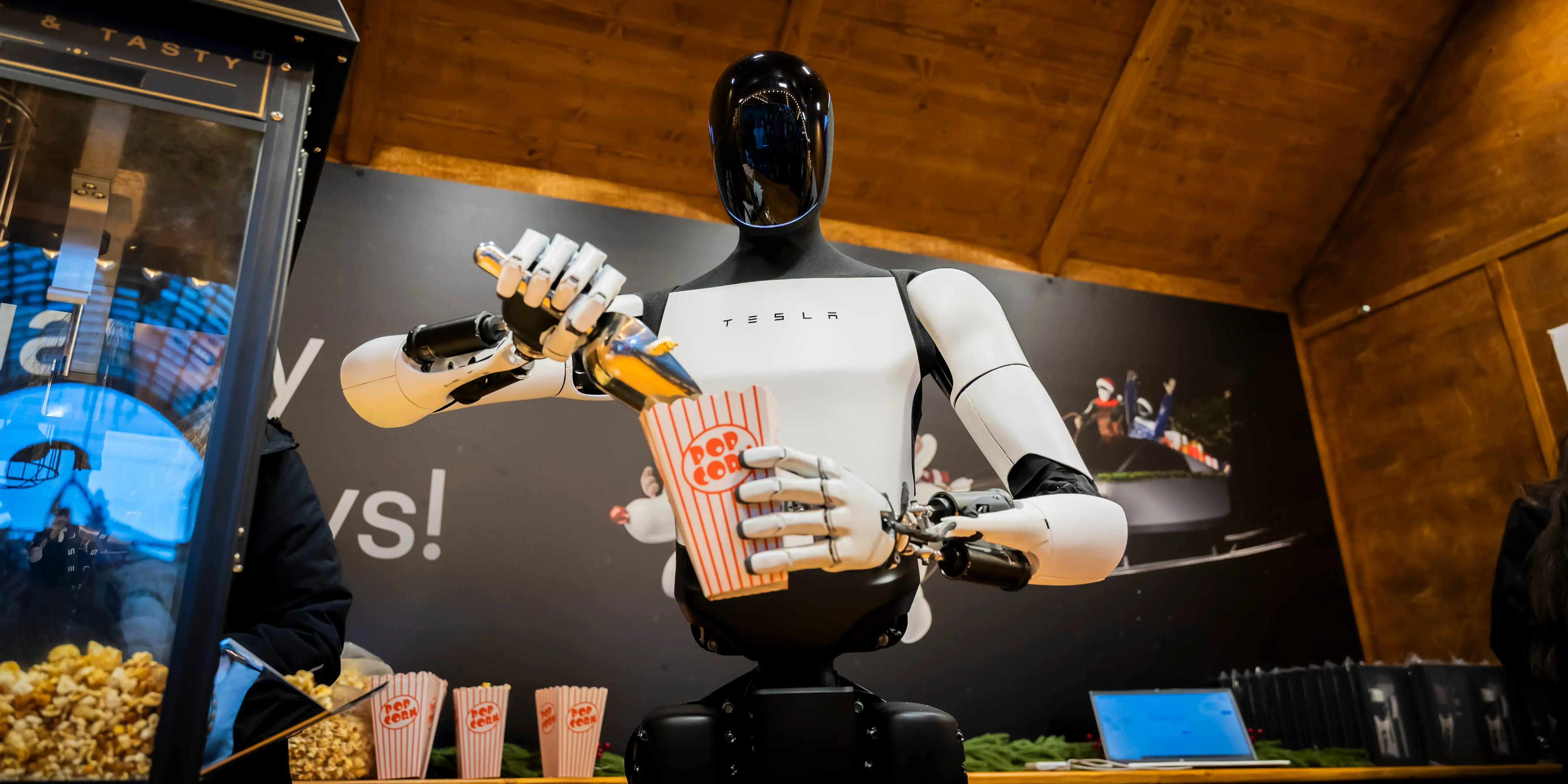 Tesla's Optimus robot is scooping popcorn