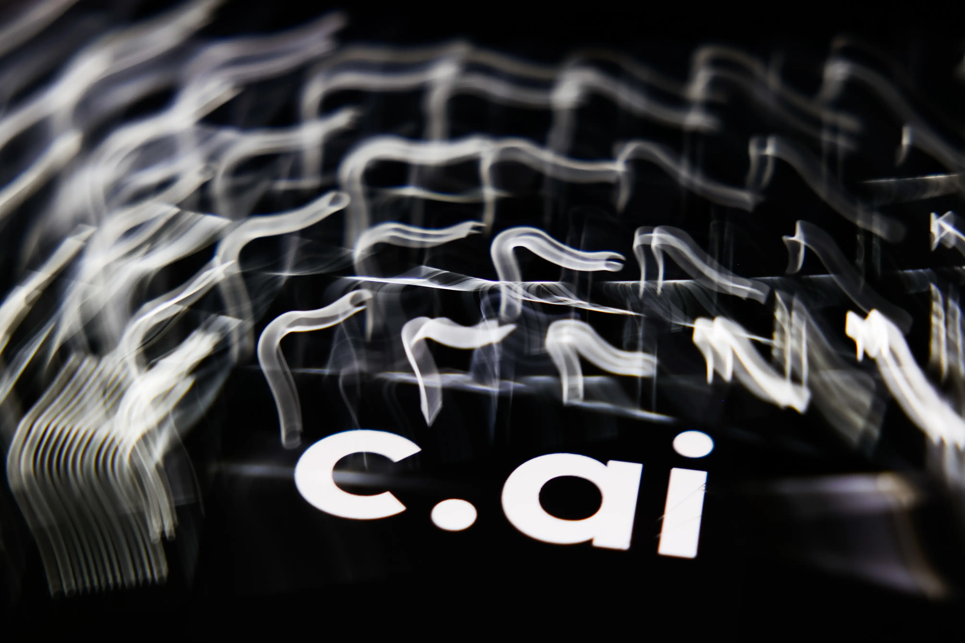 A Character.AI logo displayed on a phone screen in Poland in May 2025