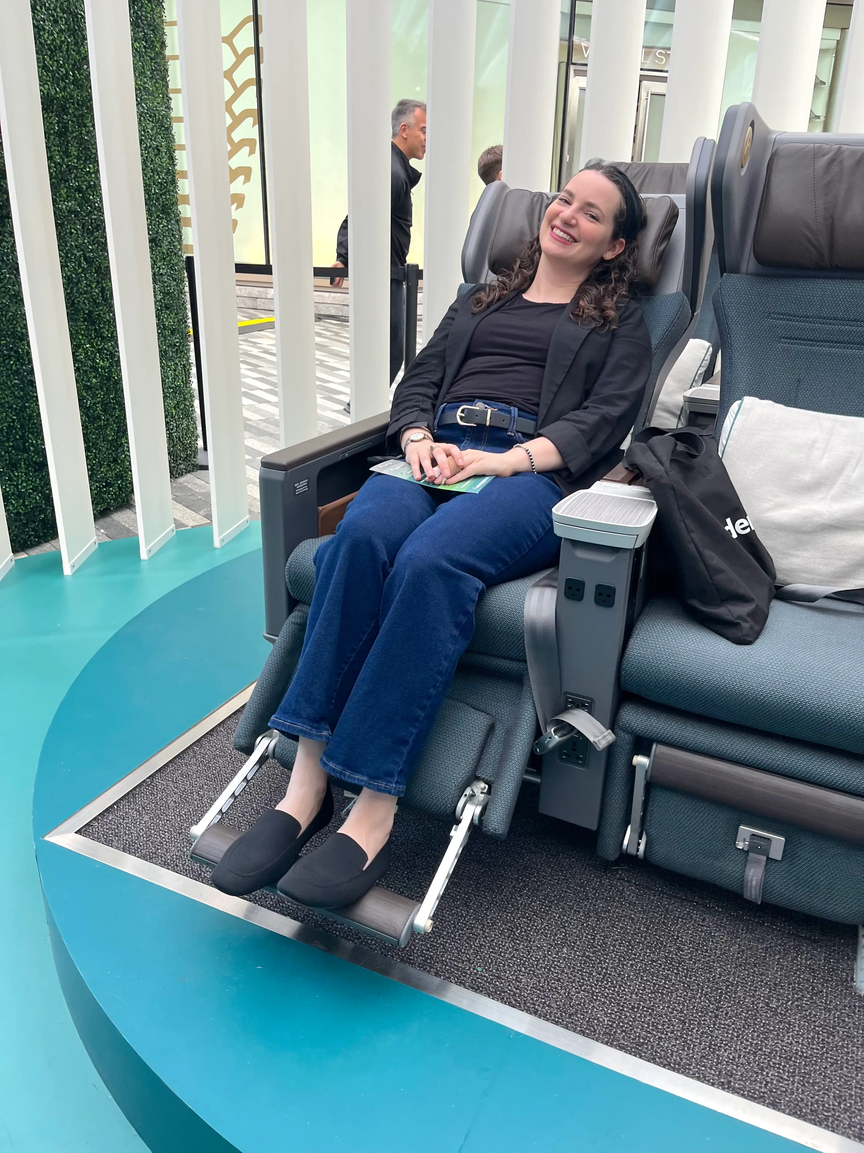 Testing out Cathay Pacific's premium economy seat.