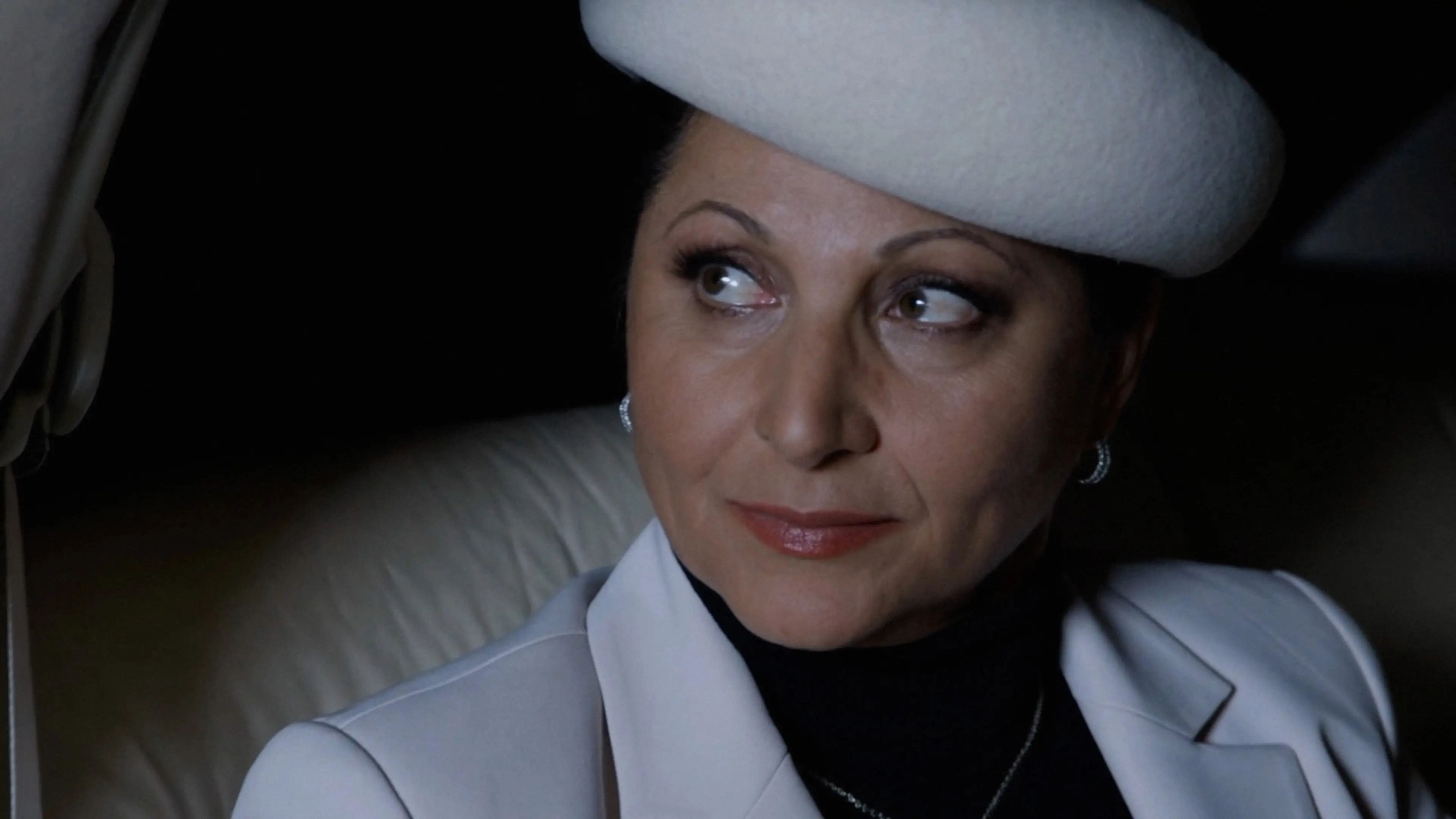 Griselda Blanca AI generated sitting in the back of a car