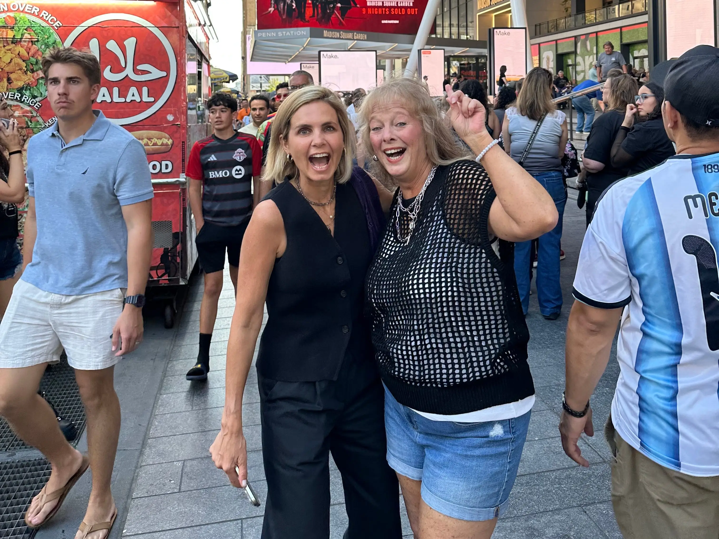 Two women standing outside Madison Square Garden.