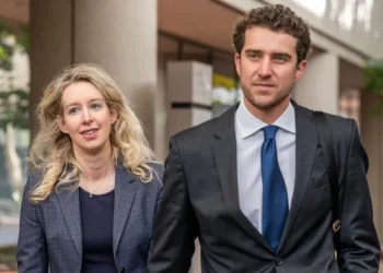 Elizabeth Holmes’ partner, Billy Evans, is the real villain in ‘You Can See Everything.’ Here’s what to know about him.