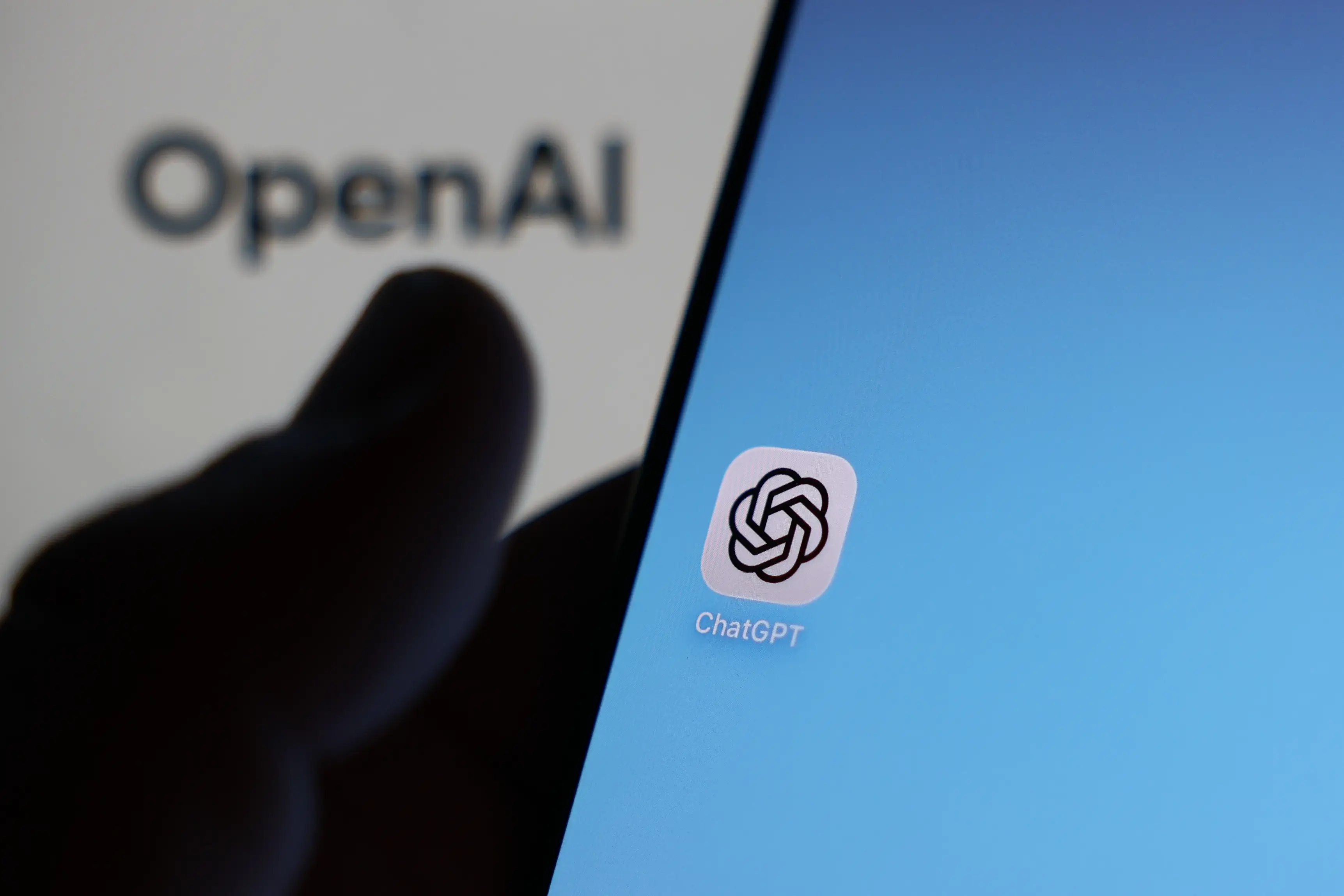 OpenAI website displayed on a laptop screen and ChatGPT icon displayed on a phone screen are seen in this illustration photo taken in Krakow, Poland on April 16, 2026. (Photo by Jakub Porzycki/NurPhoto via Getty Images)