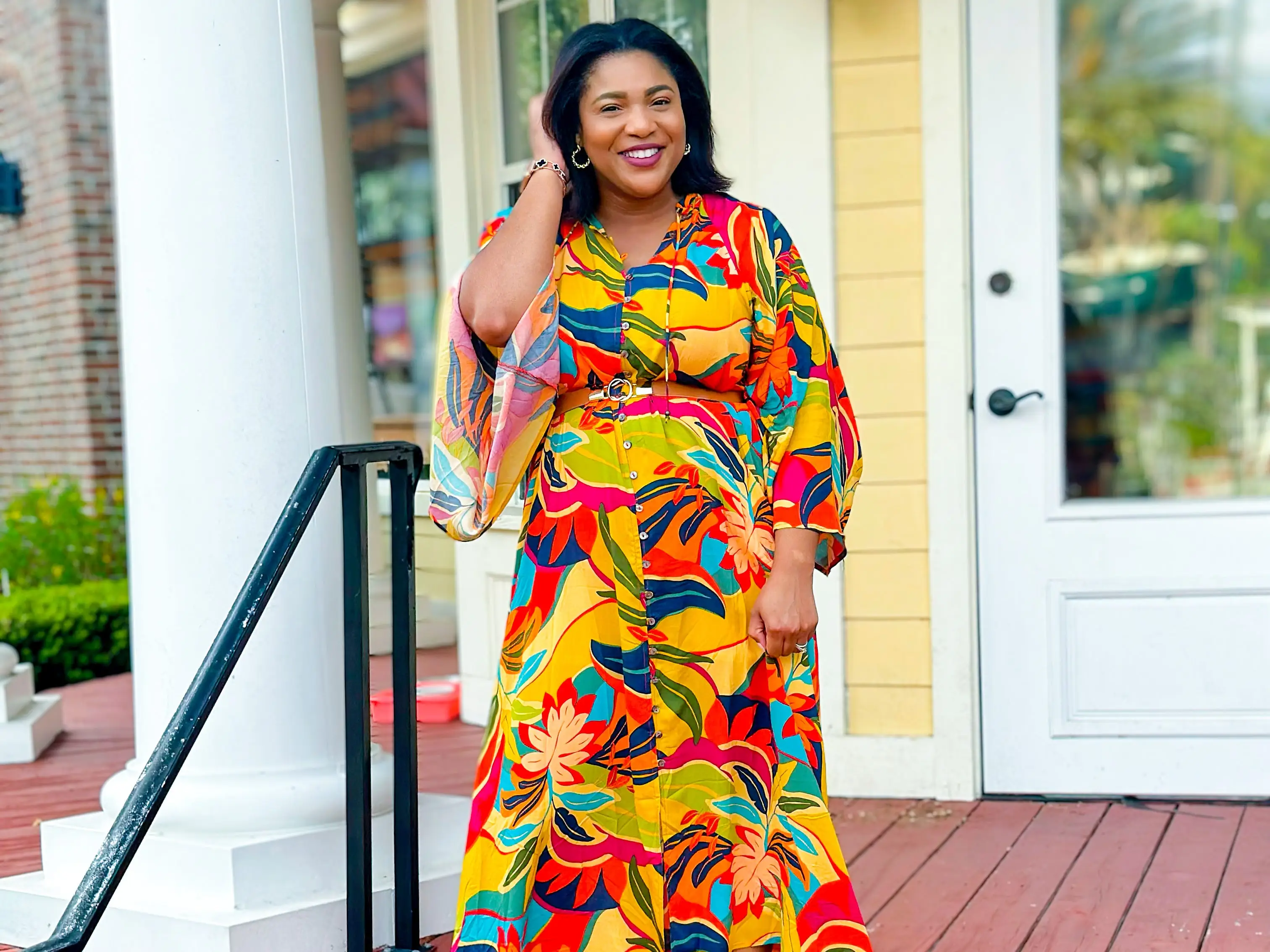 Woman with colorful dress posing for photo