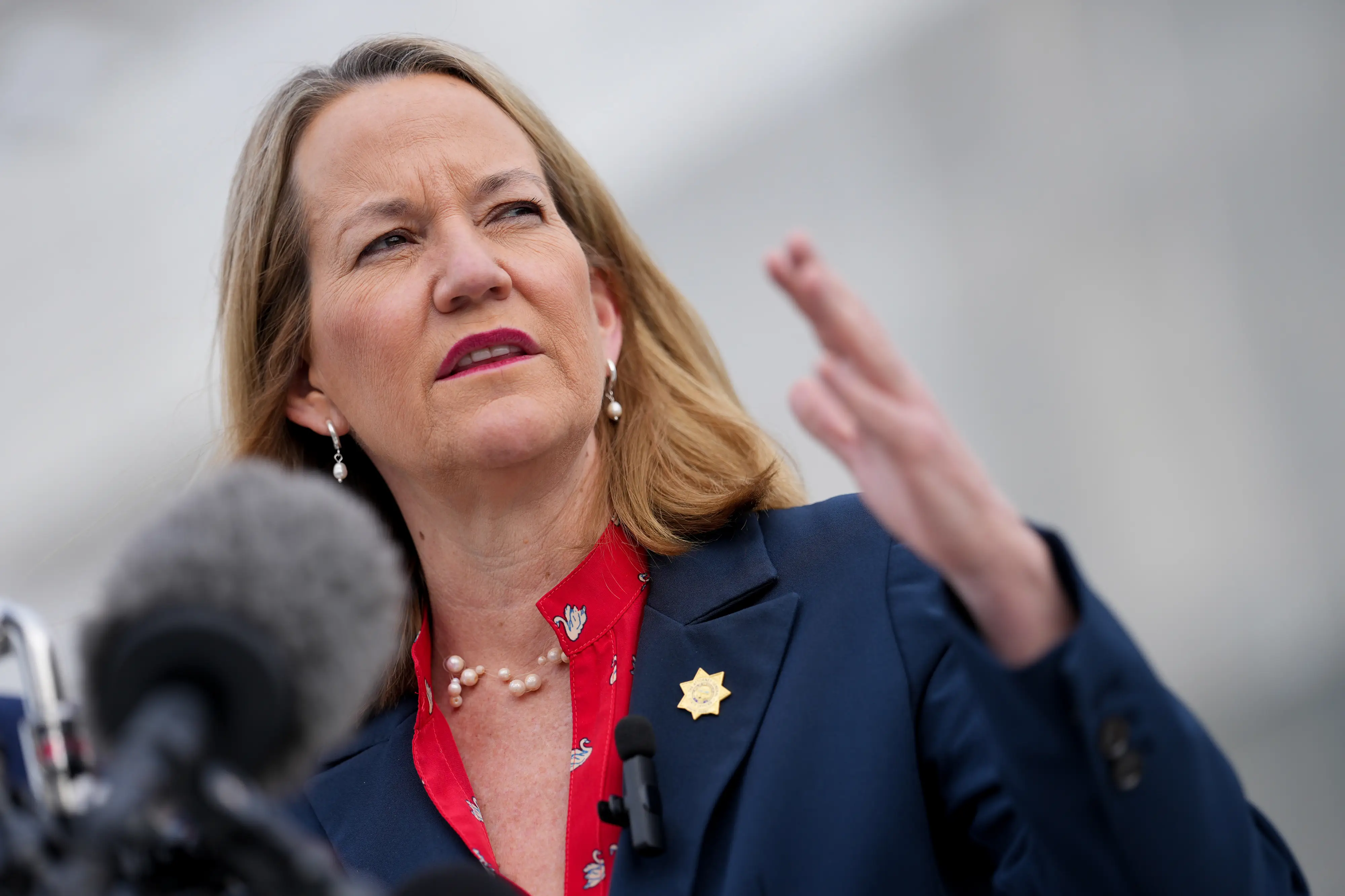 Kris Mayes, Arizona's attorney general, speaks to members of the media outside the US Supreme Court in Washington, DC, US, on Wednesday, Nov. 5, 2025