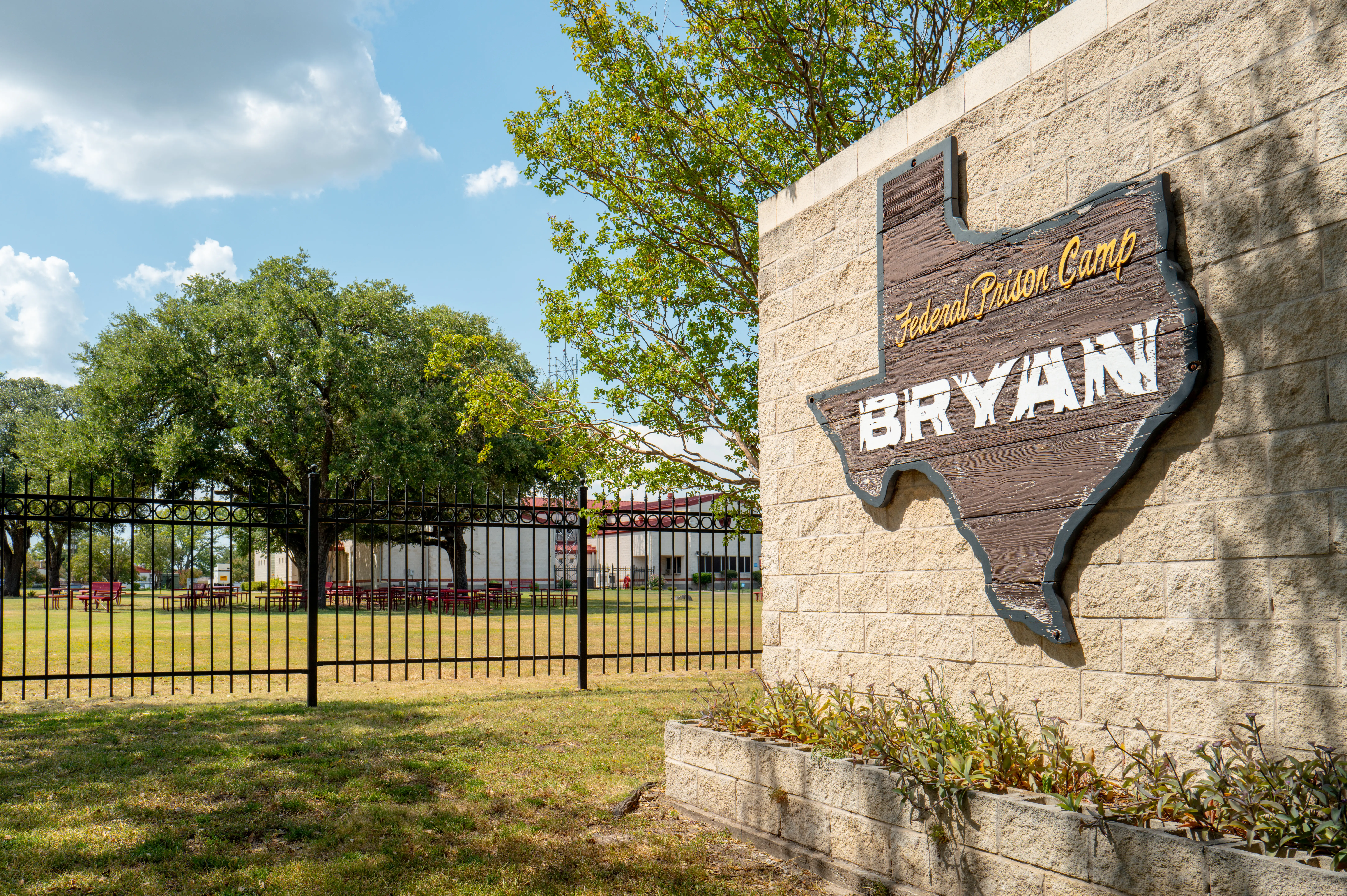Signage is displayed near the entrance to Federal Prison Camp Bryan on August 1, 2025, in Bryan, Texas.