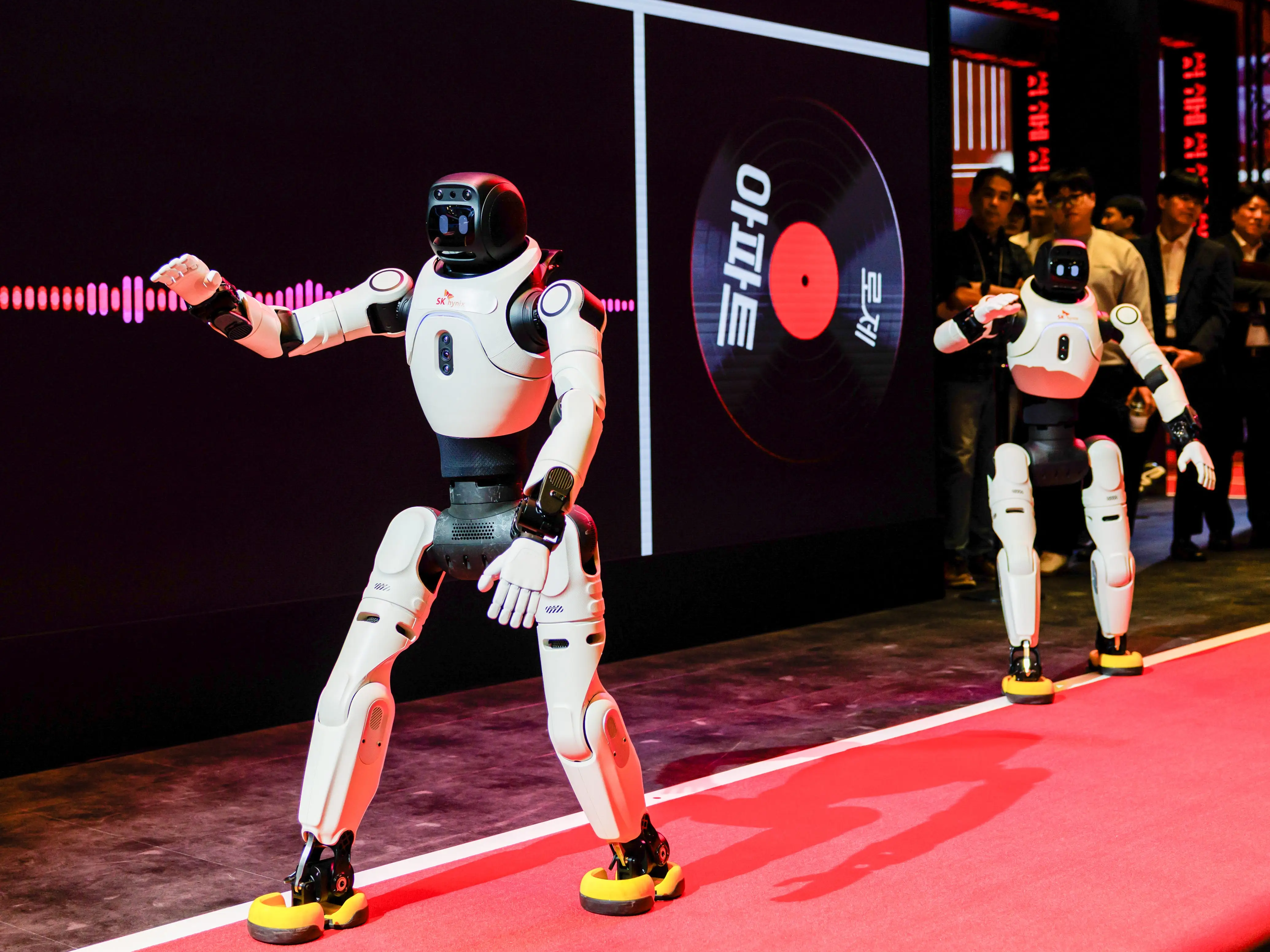 two humanoids walking