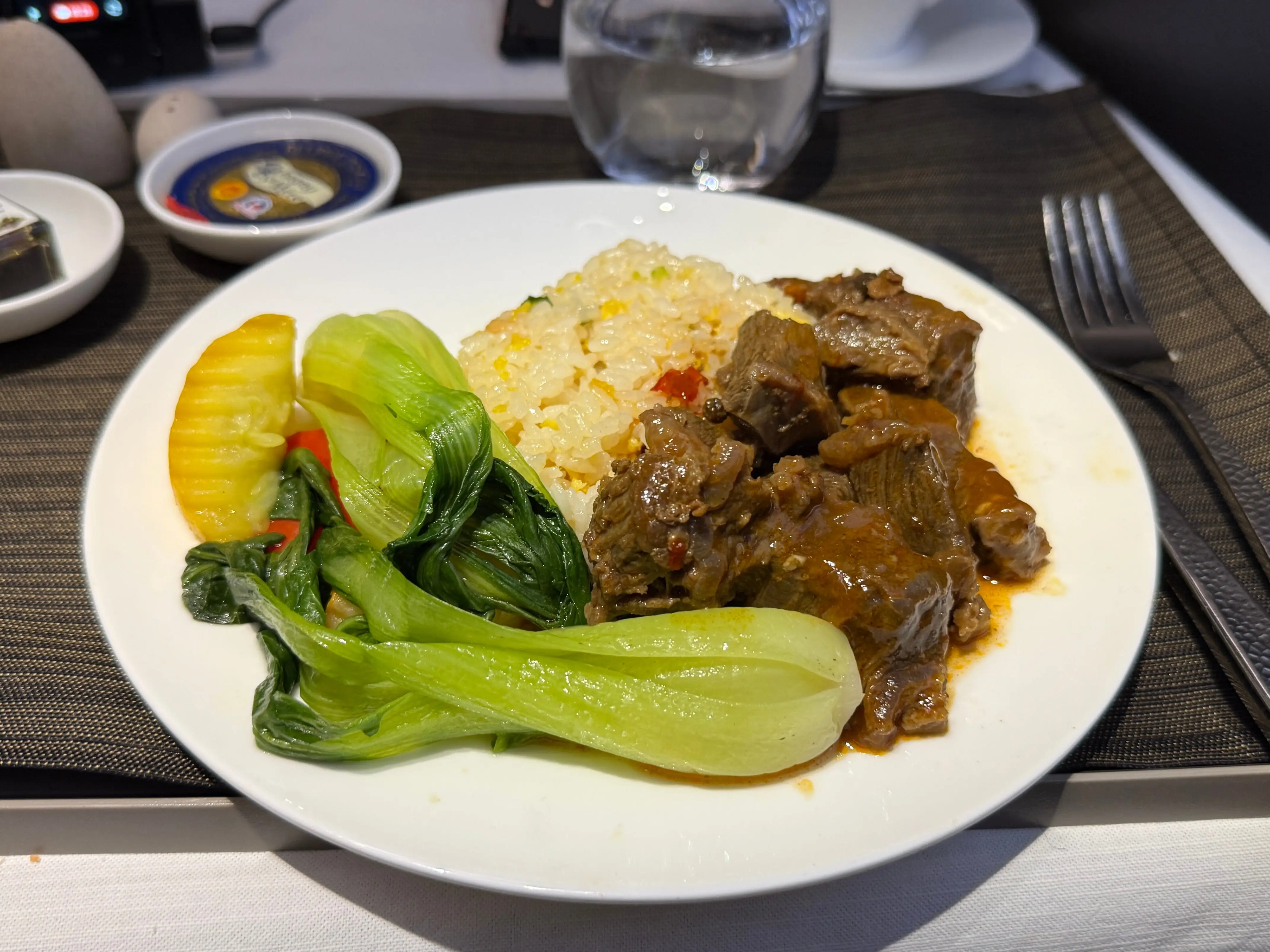 The beef dish with green leak plated.