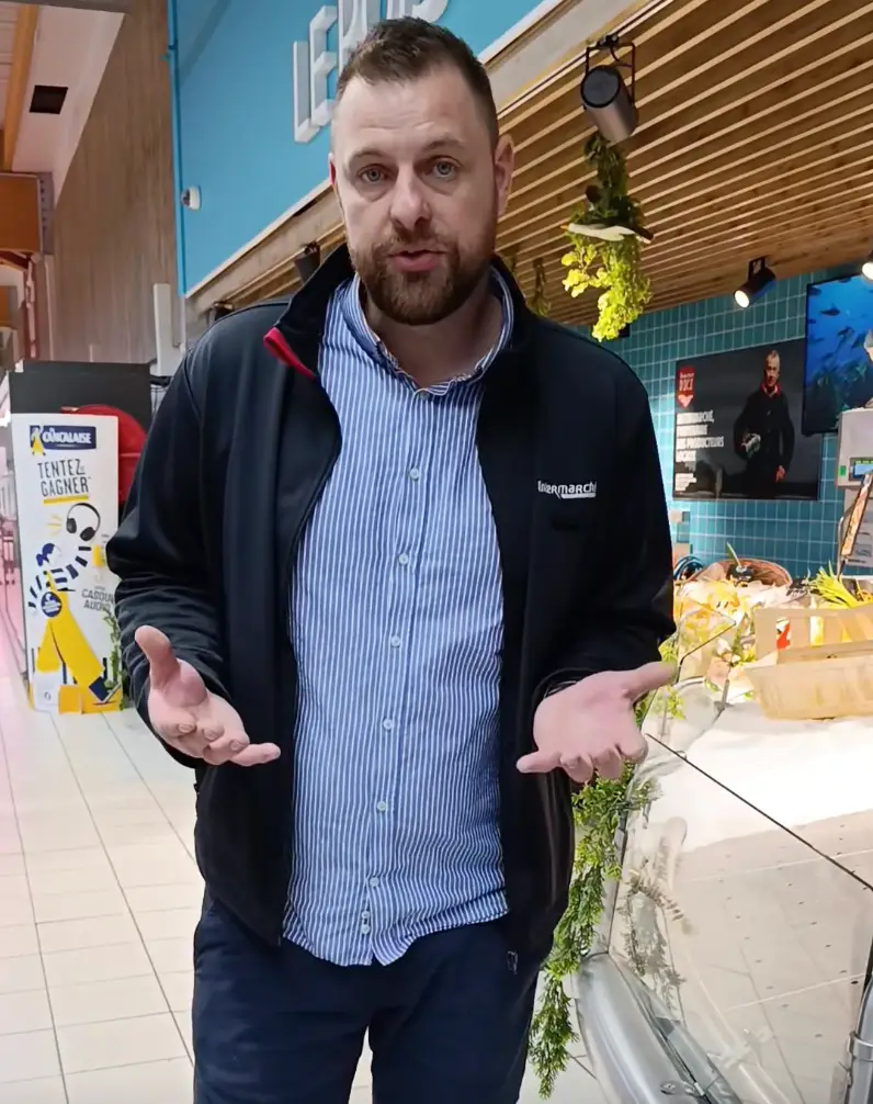 Julien Fréret in front of the fish section