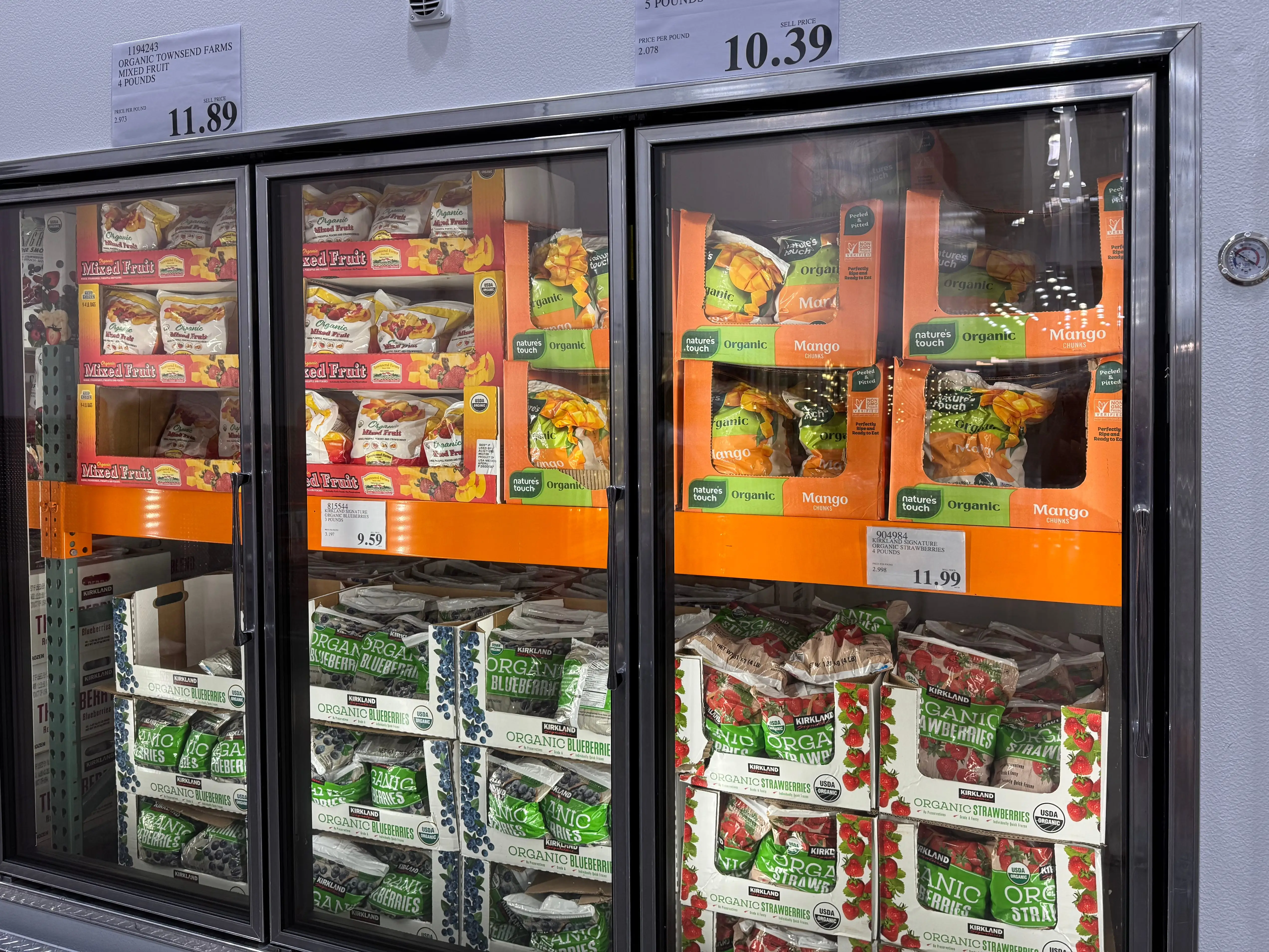 Freezers full of frozen fruit at Costco.