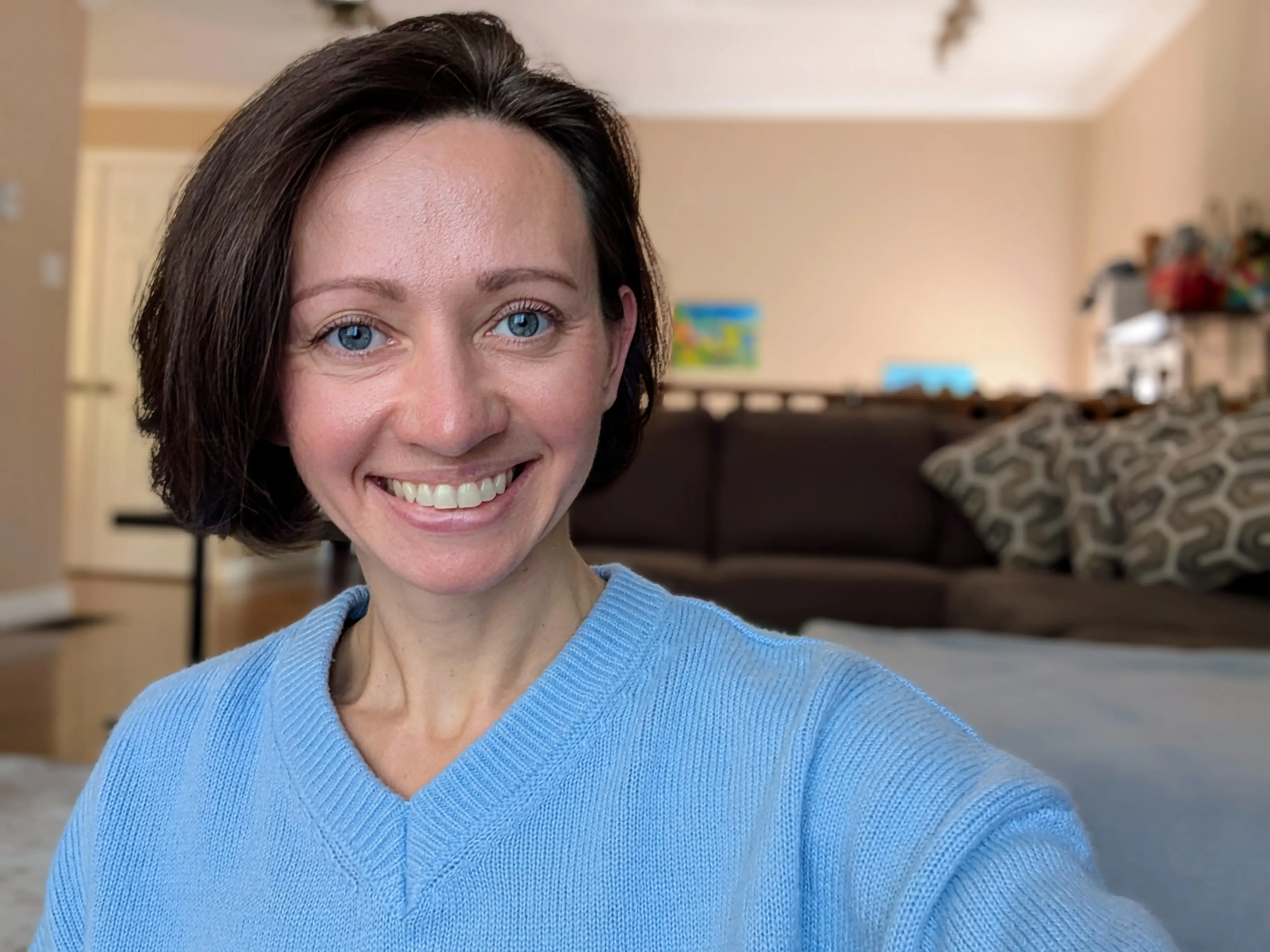 Woman smiling in living room
