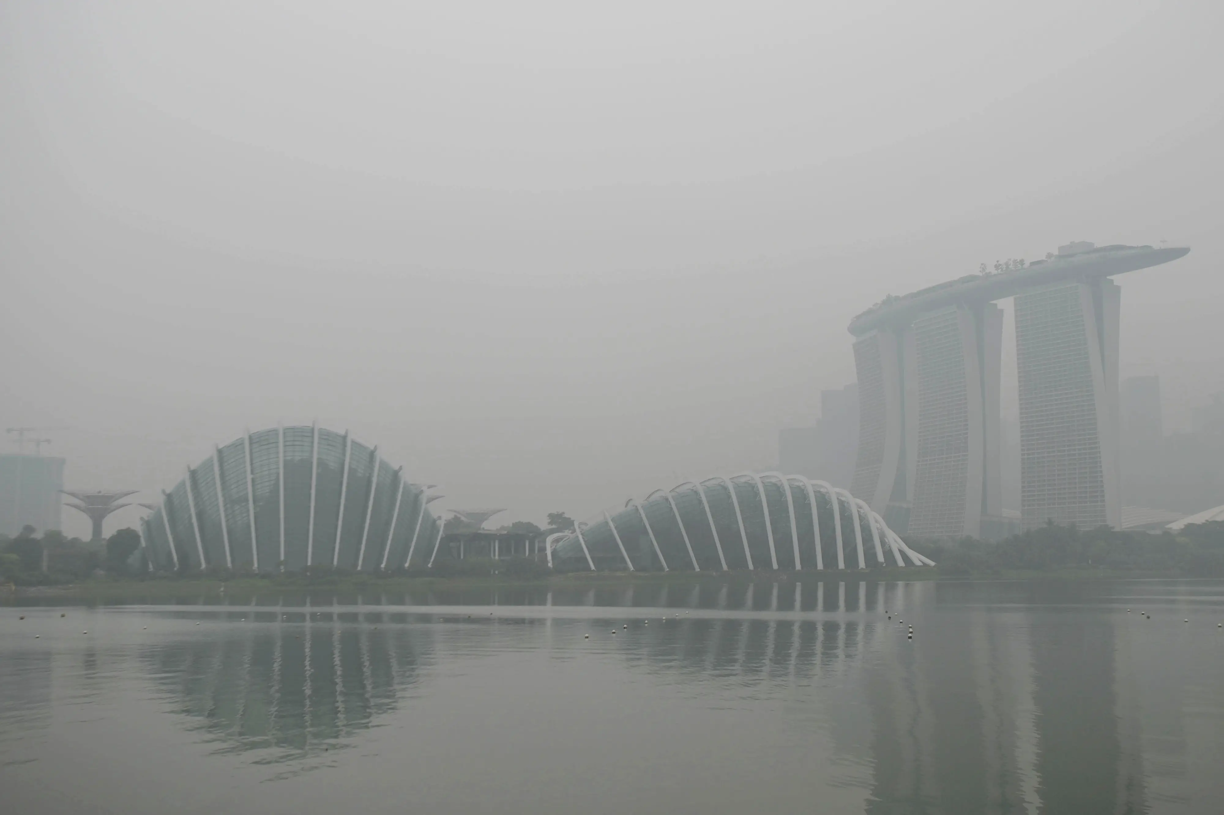 The Flower Dome, Cloud Forest and Marina Bay Sands are seen in Singapore on October 15, 2026, as the country continues to be shrouded in haze caused by fires in Indonesia.