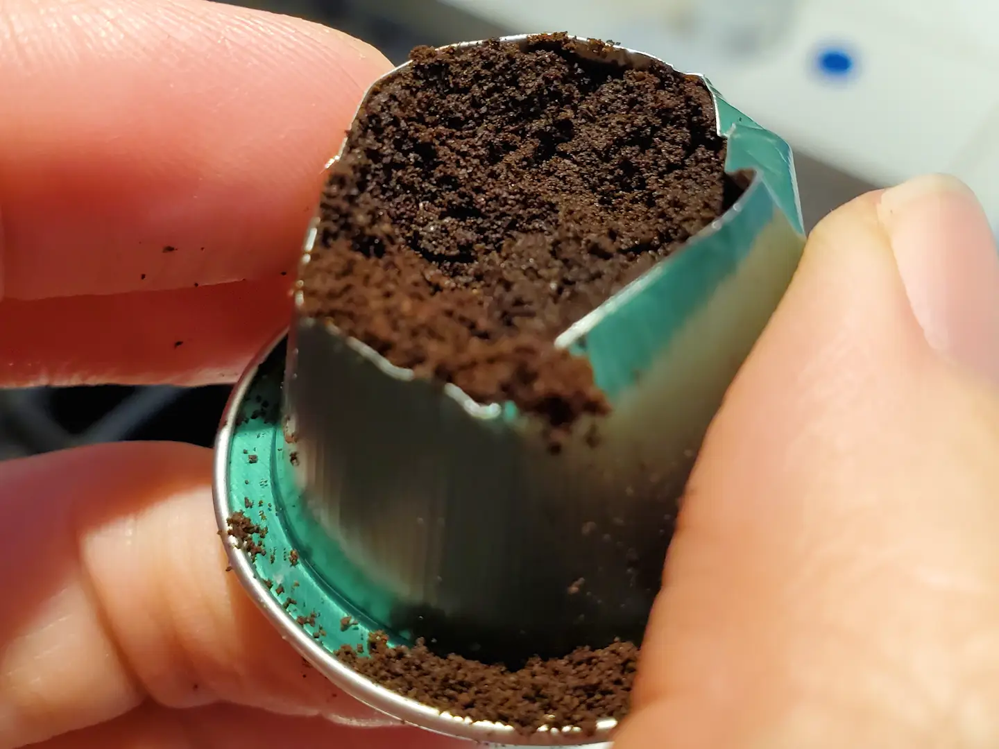 An open coffee pod