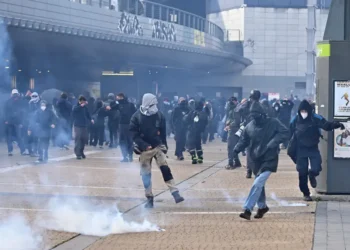 Chaos and looting roiled major cities as Europeans poured into the streets to protest rising living costs