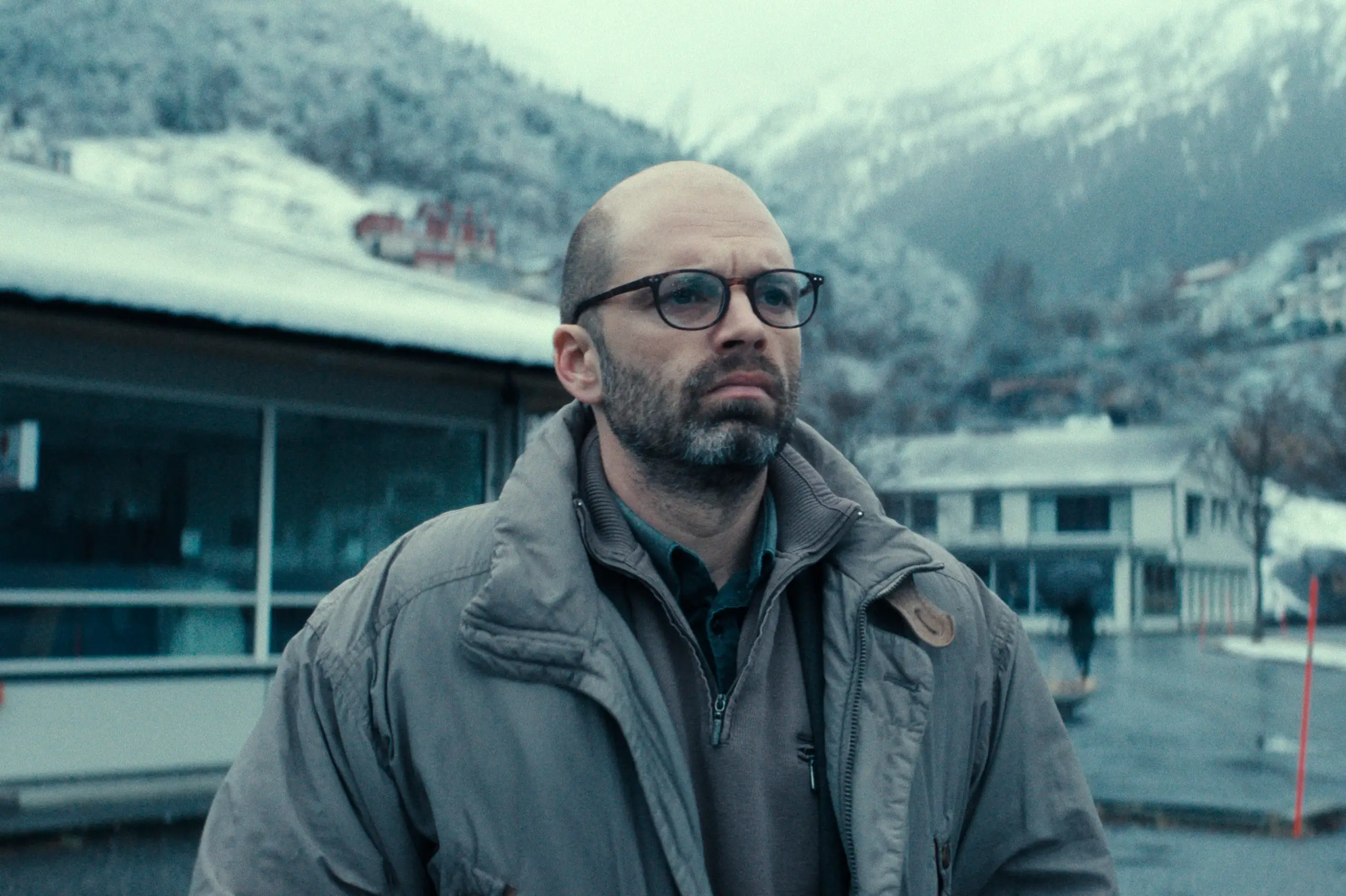 Sebastian Stan in a winter jacket in Fjord movie