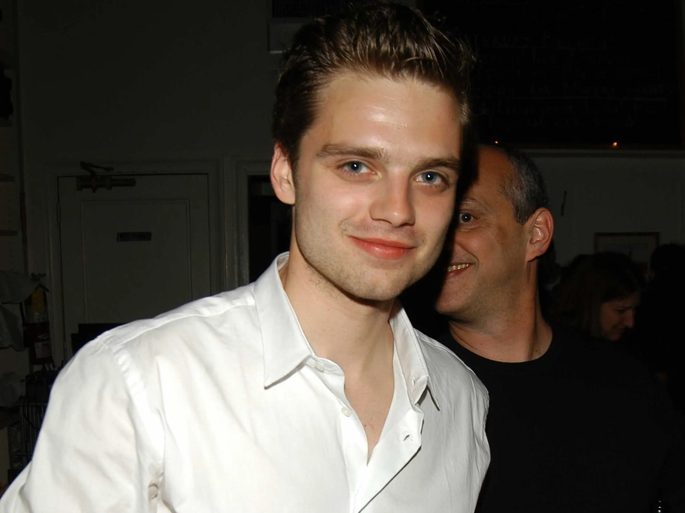 Sebastian Stan in a white shirt