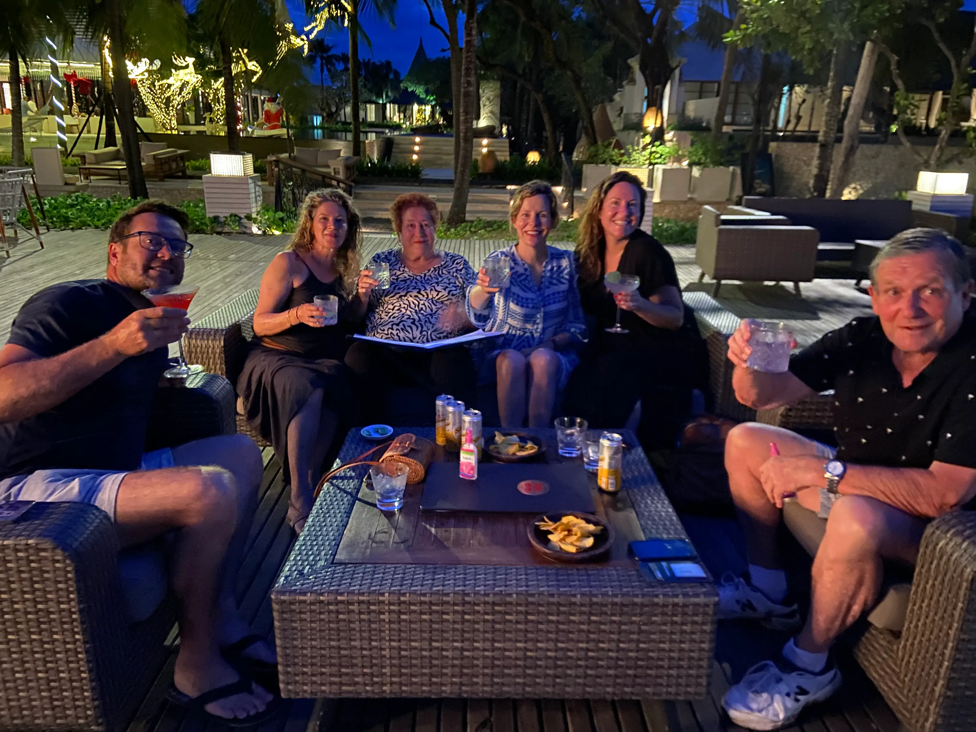 the author and her family outside on a patio at night in Bali