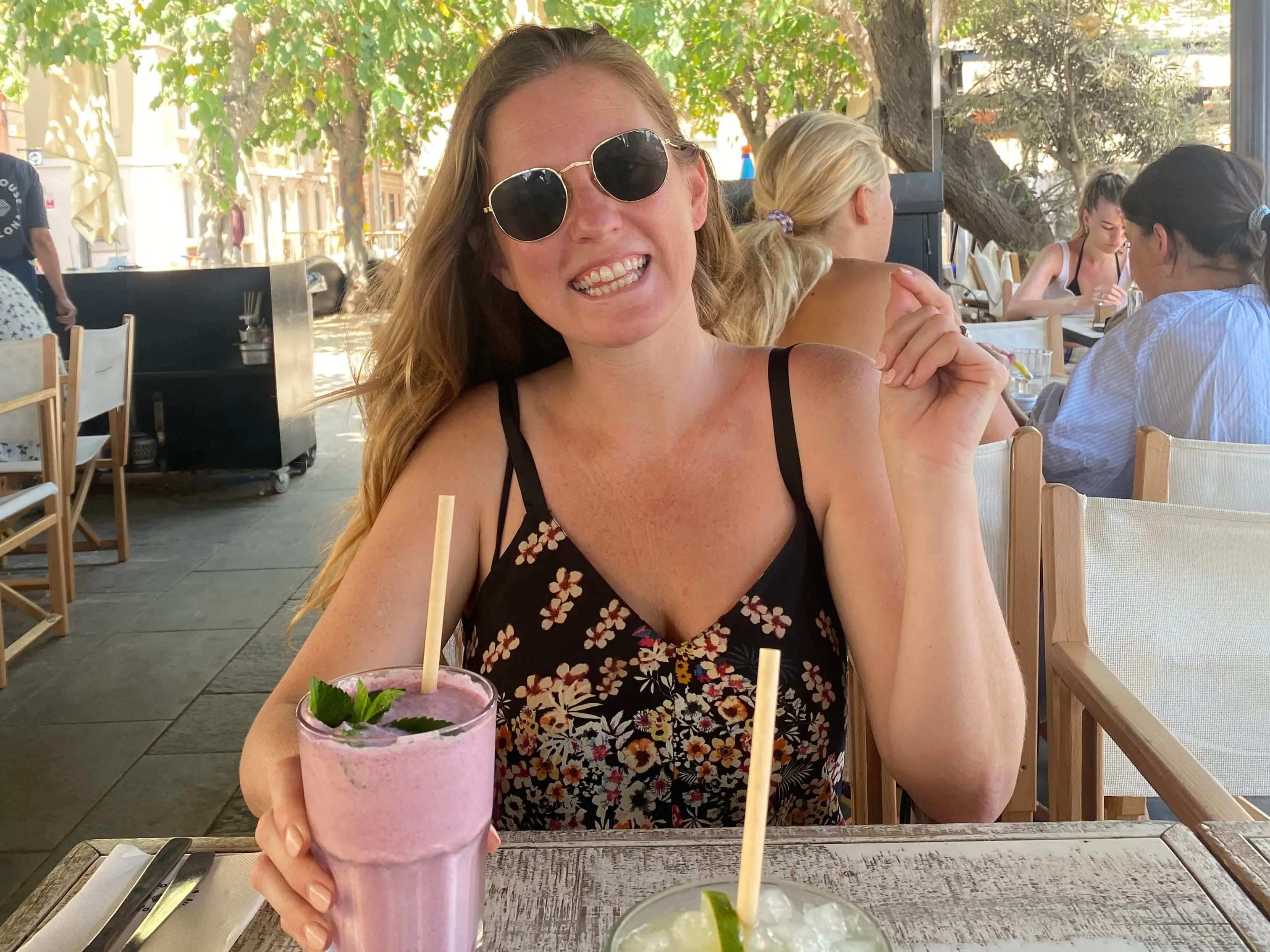 Woman smiling with drink