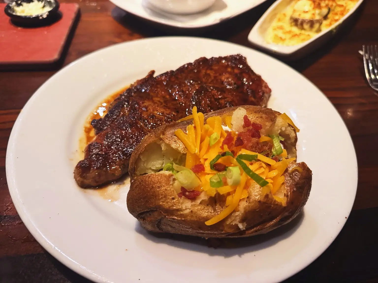 longhorn steakhouse ribeye and loaded potato